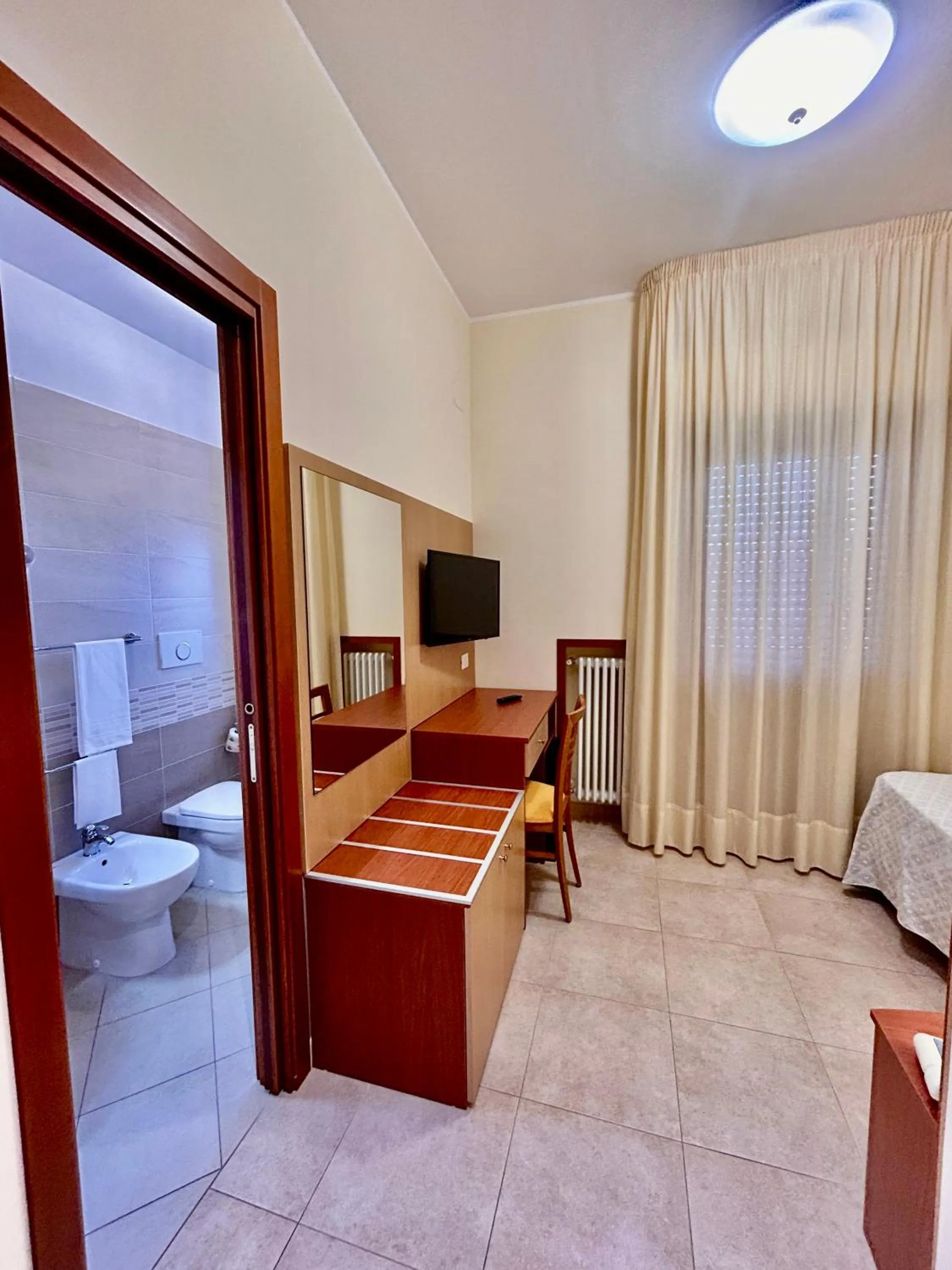 Bed in Il Nocchiero City Hotel