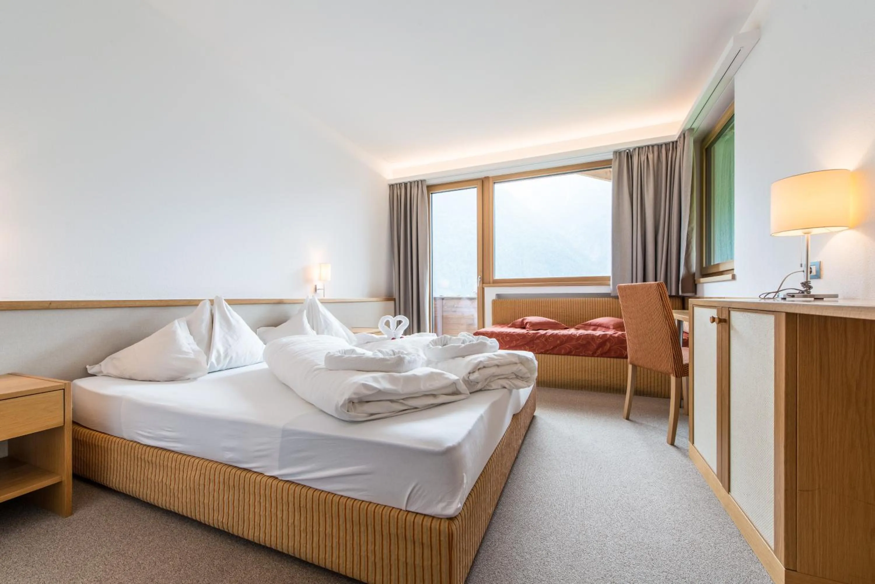 Bed in Hotel Taufers