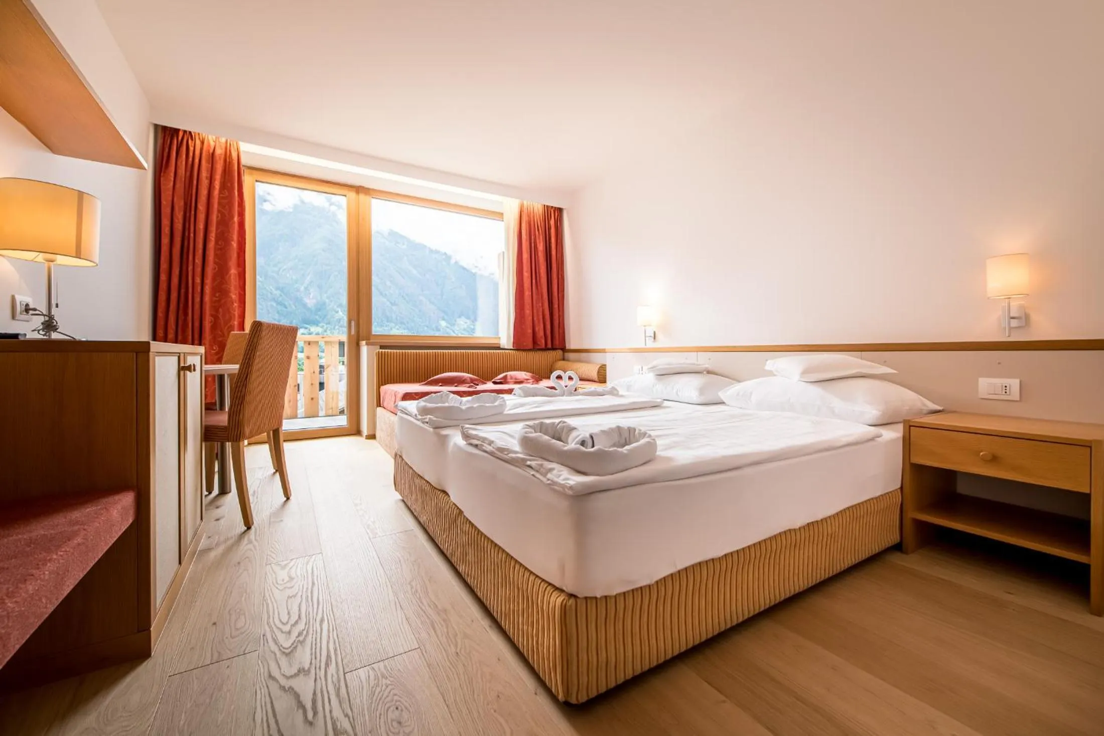 Bed in Hotel Taufers