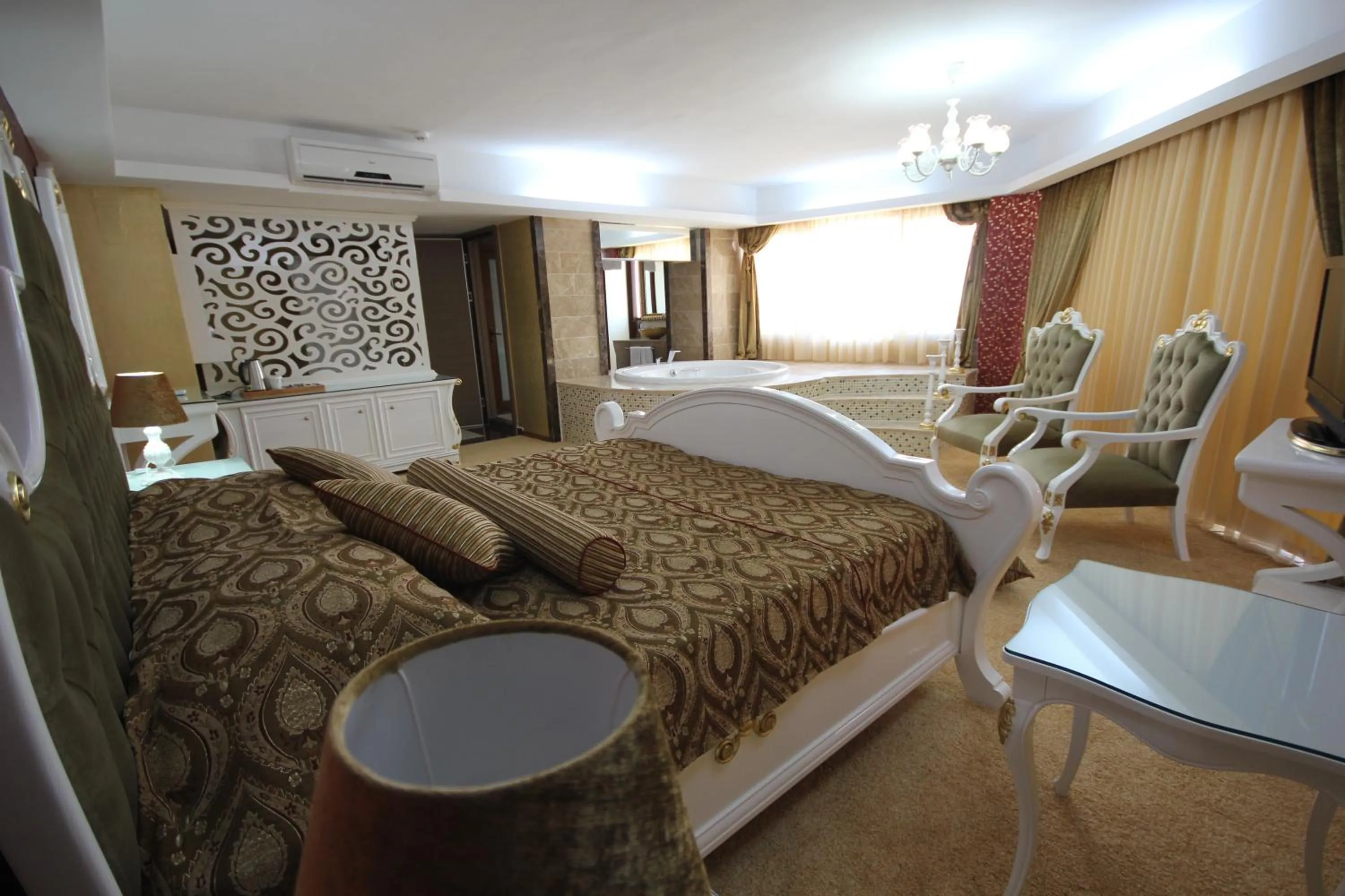Photo of the whole room, Bed in Grand Corner Boutique Hotel