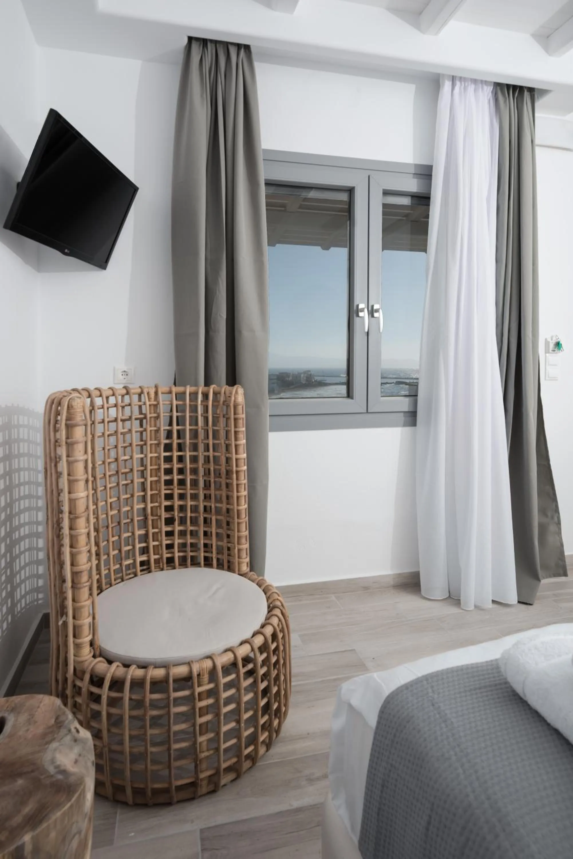 Living room, Bed in Iliada Suites