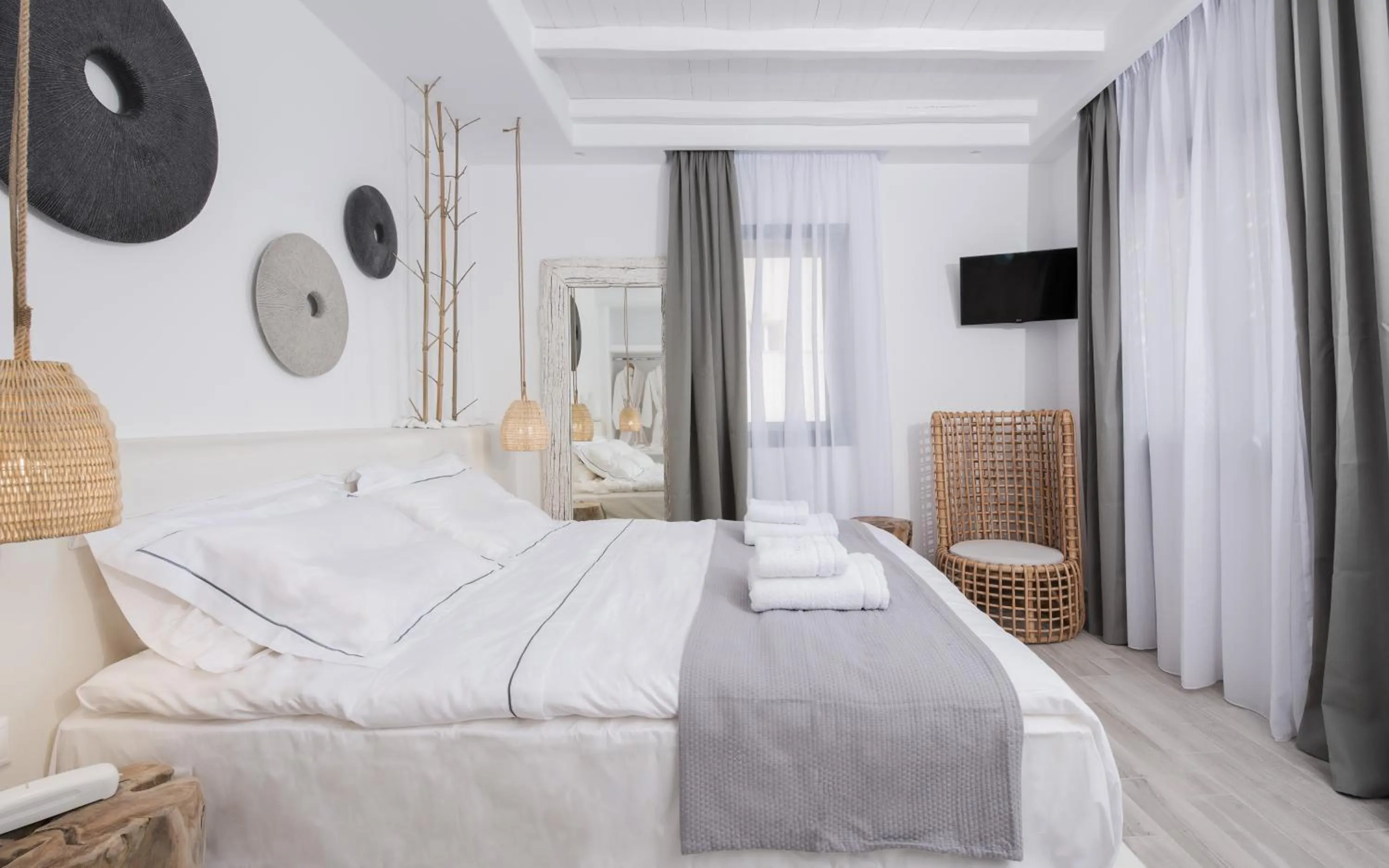 Bed in Iliada Suites