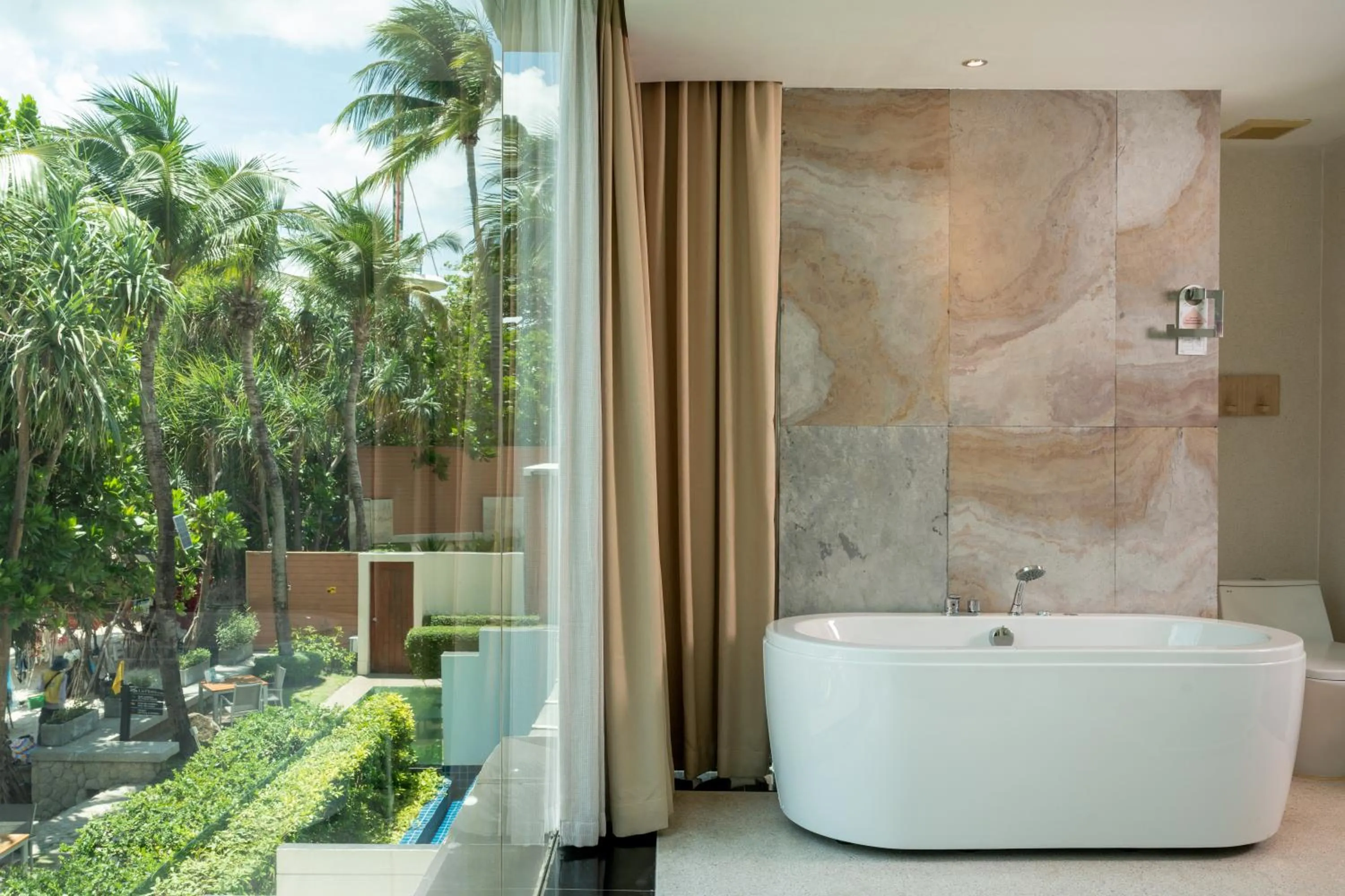 Bath in La Flora Resort Patong