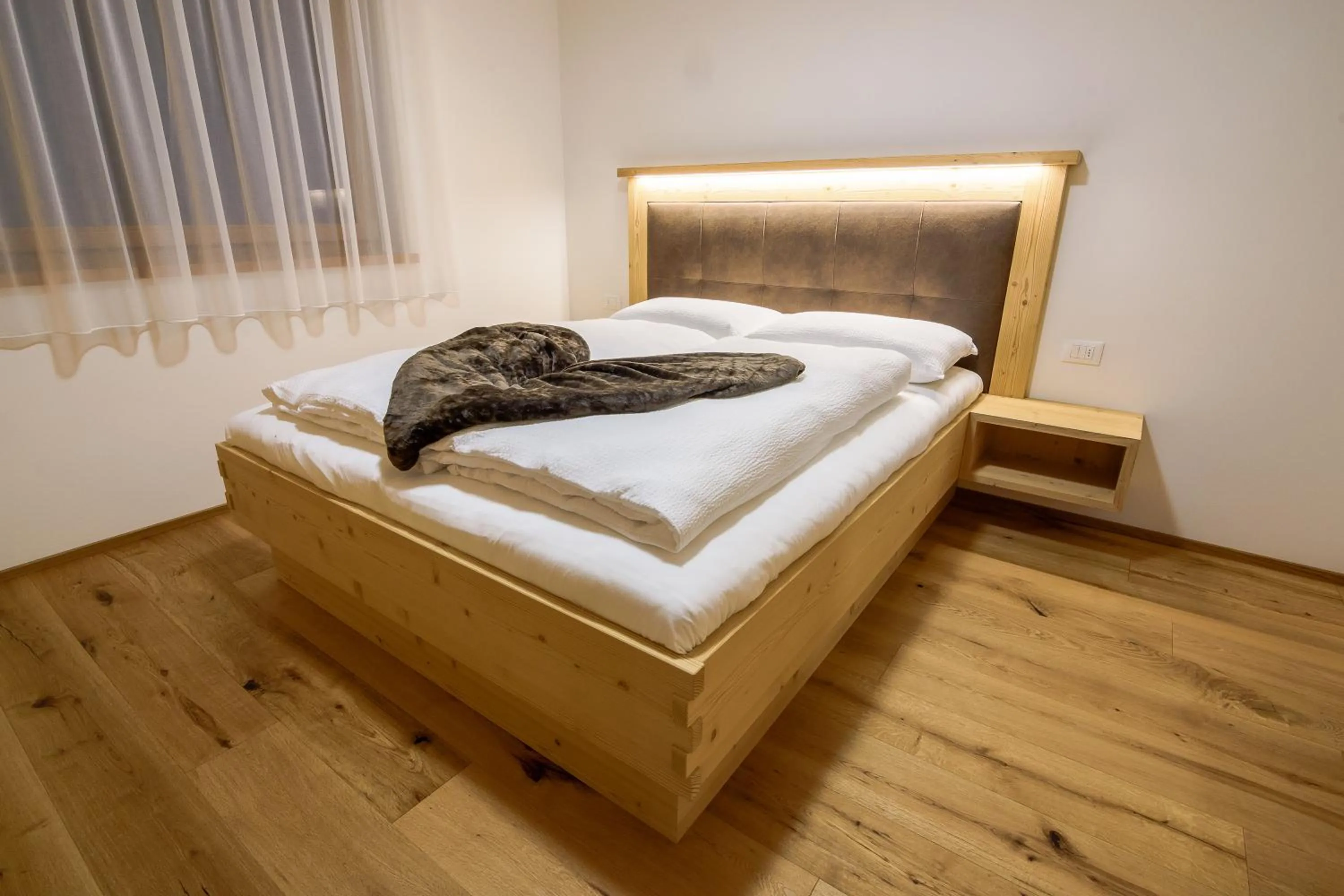 Photo of the whole room, Bed in Residence Stefansdorf