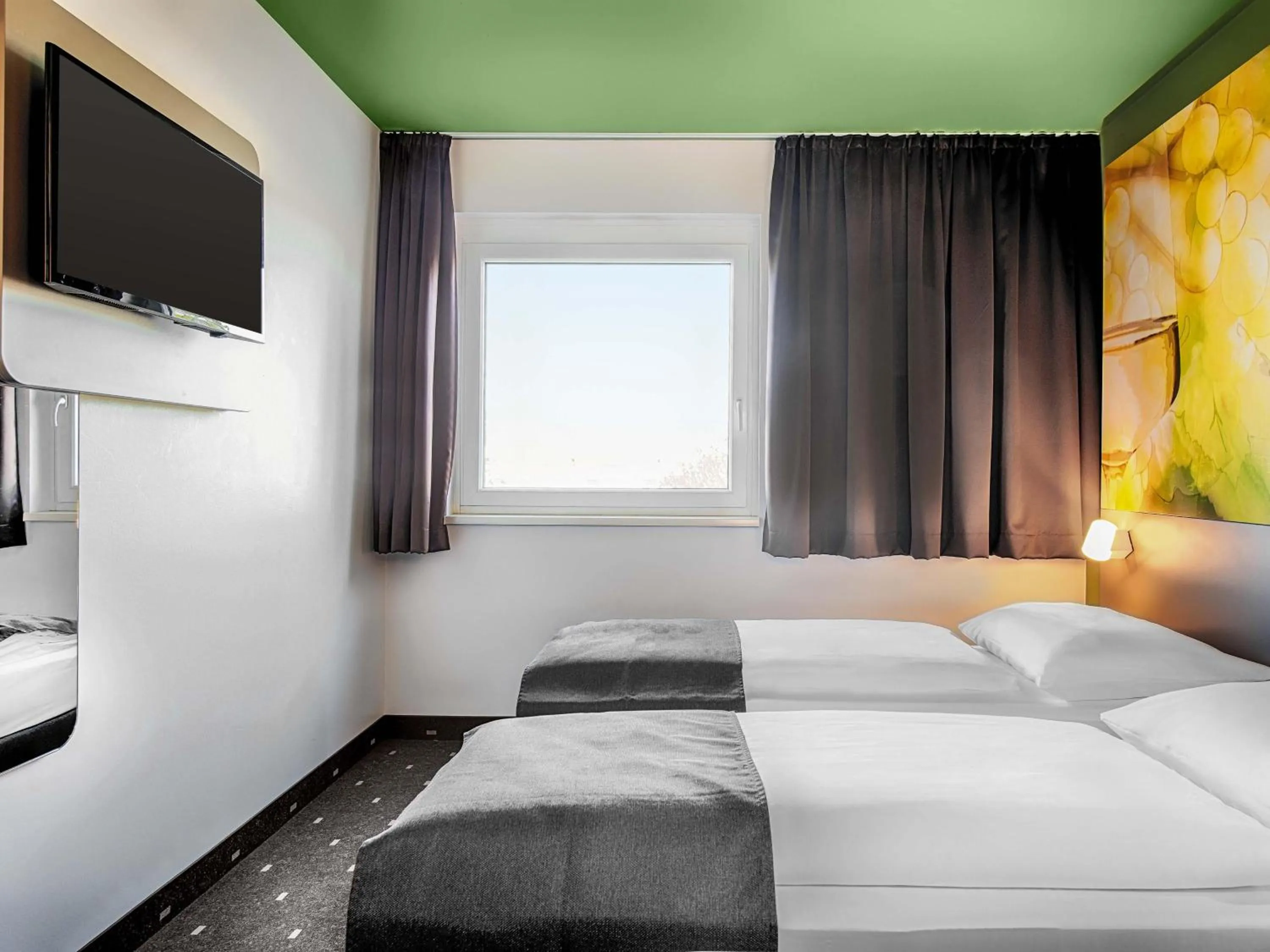 Photo of the whole room, Bed in B&B HOTEL Baden-Airpark