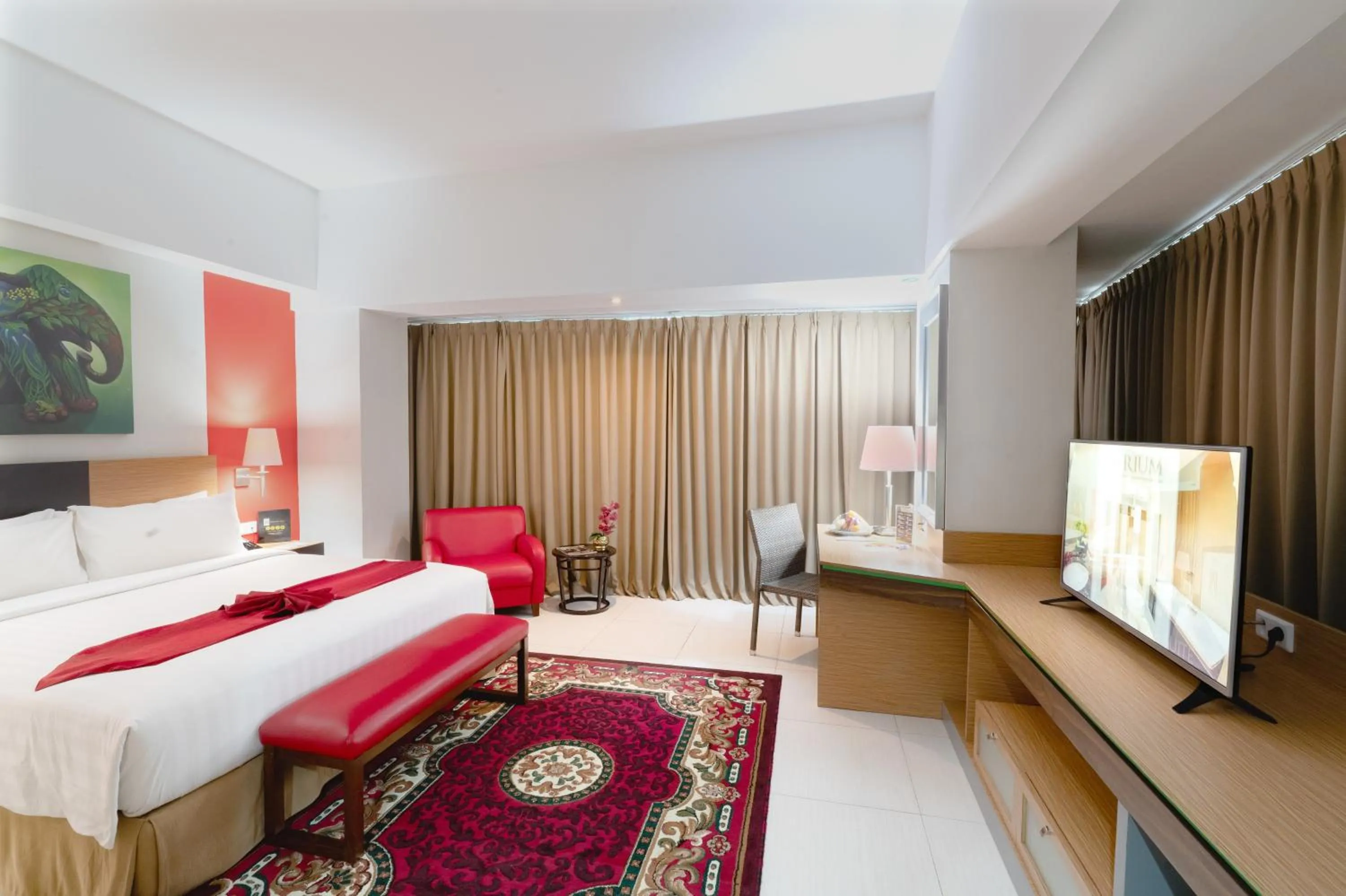 Bed in Atrium Premiere Hotel Yogyakarta Ambarukmo