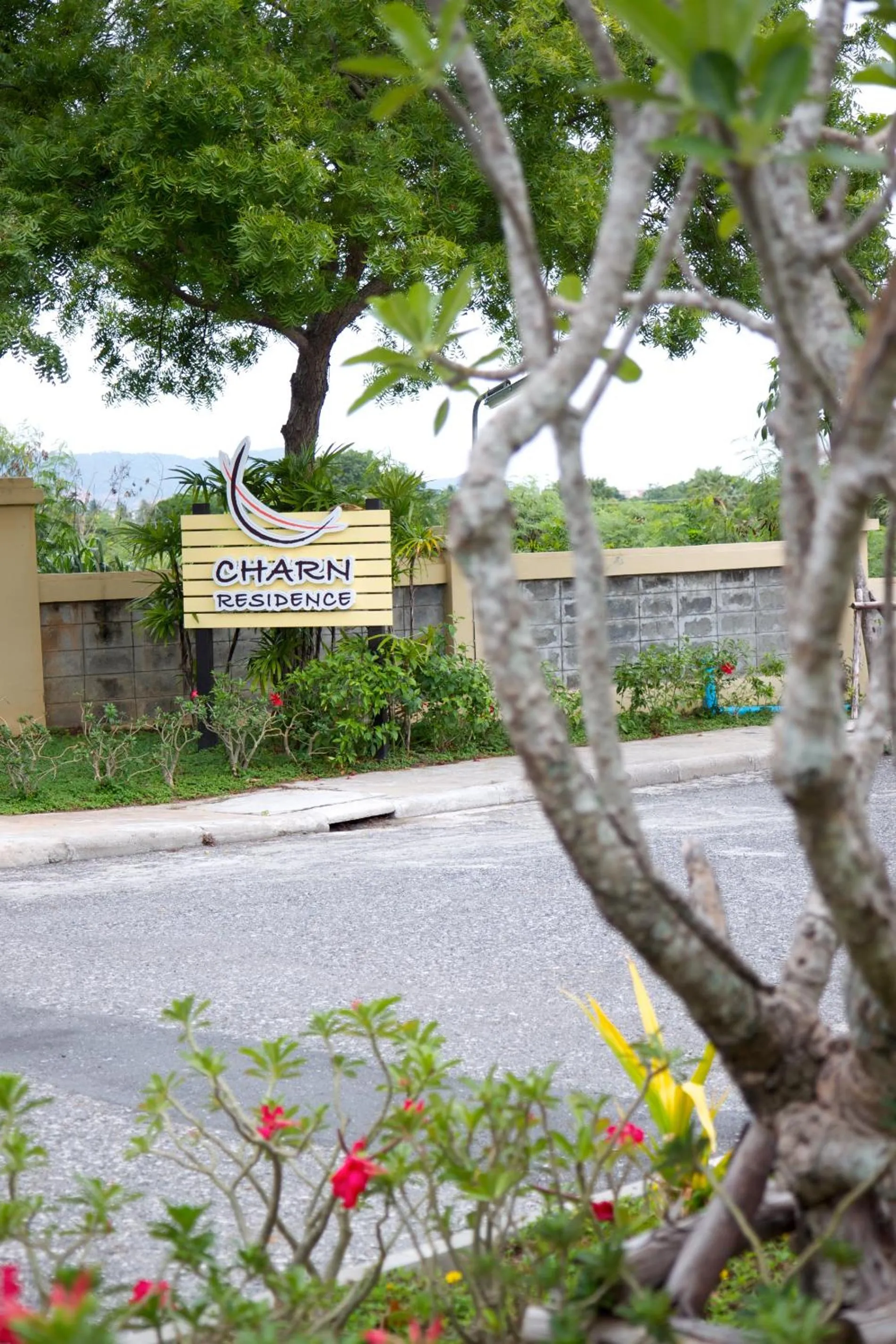 Property logo or sign in Charn Residence