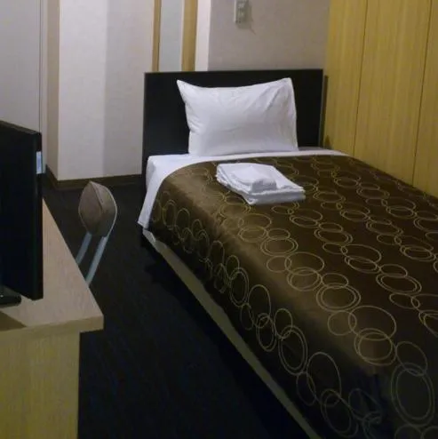 Bed in Select Inn Hamamatsu Ekimae