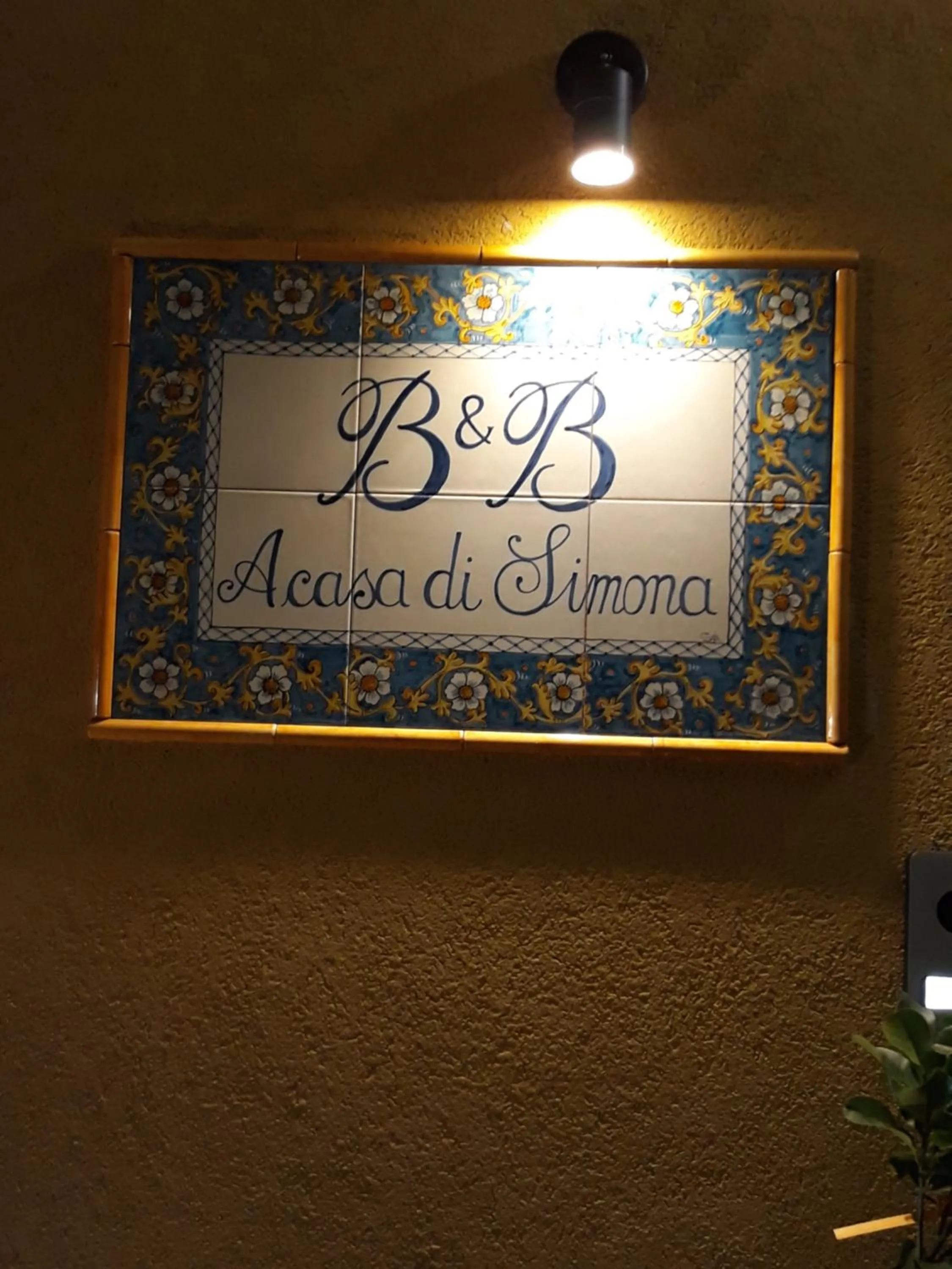Property logo or sign in A casa di Simona