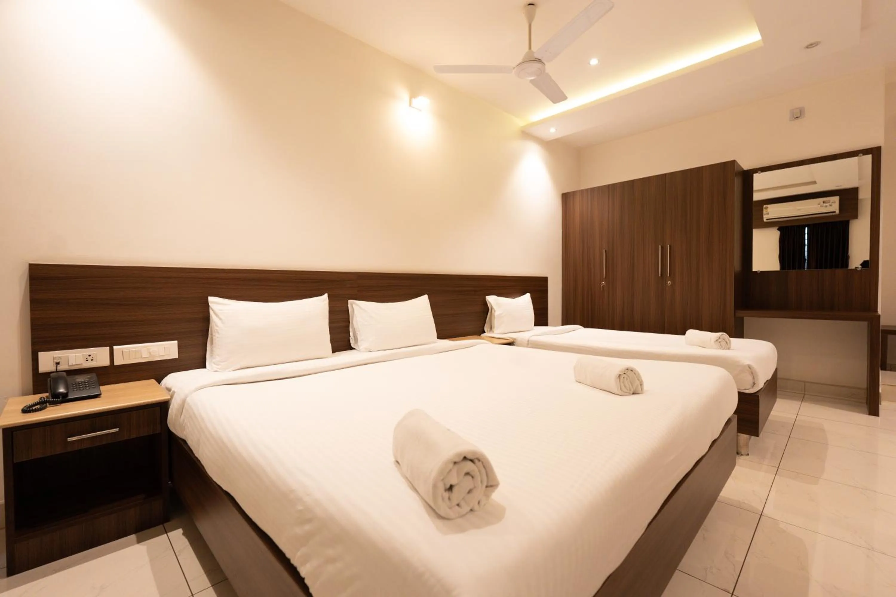 Bed in Hotel Karuna Residency