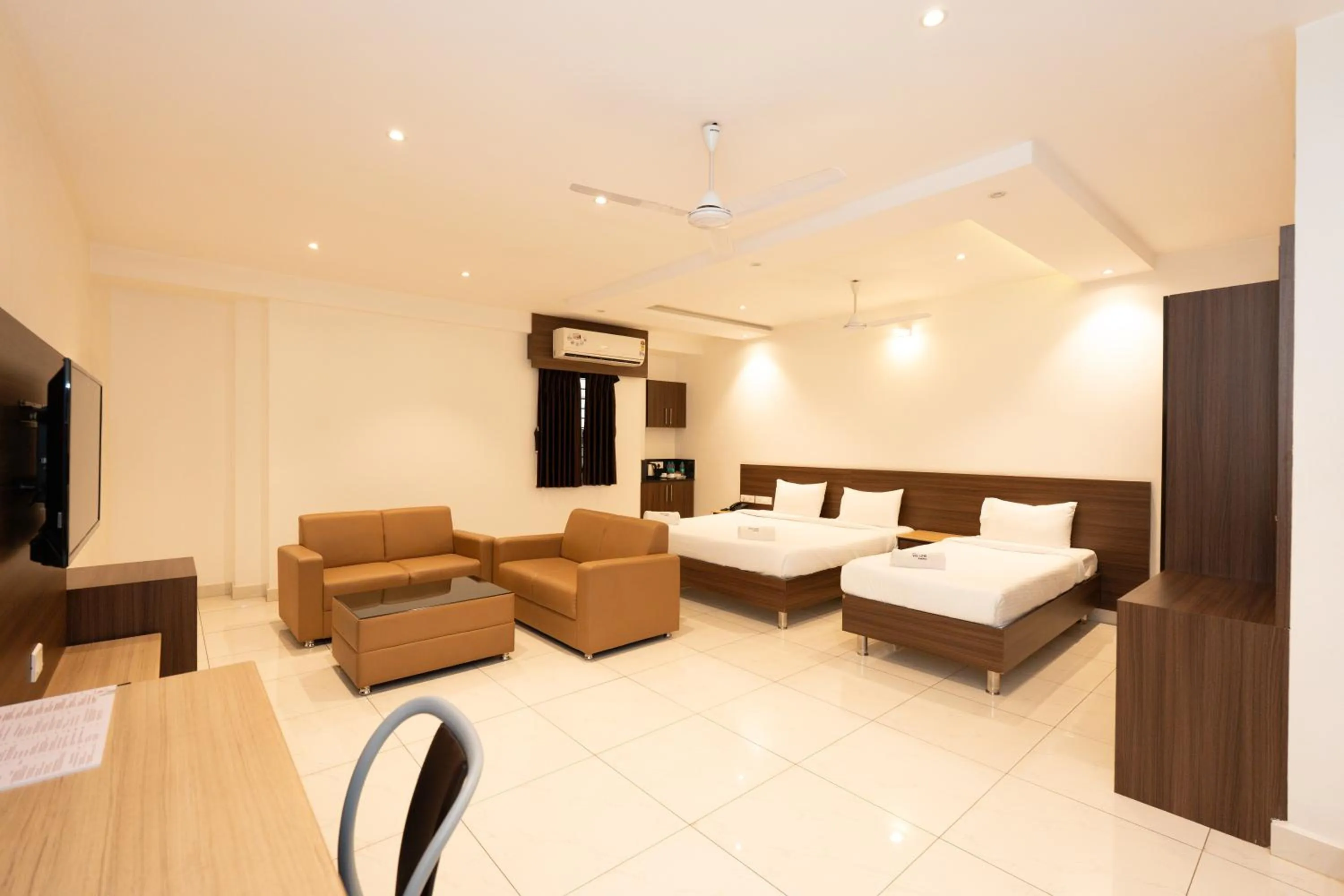 Bed in Hotel Karuna Residency