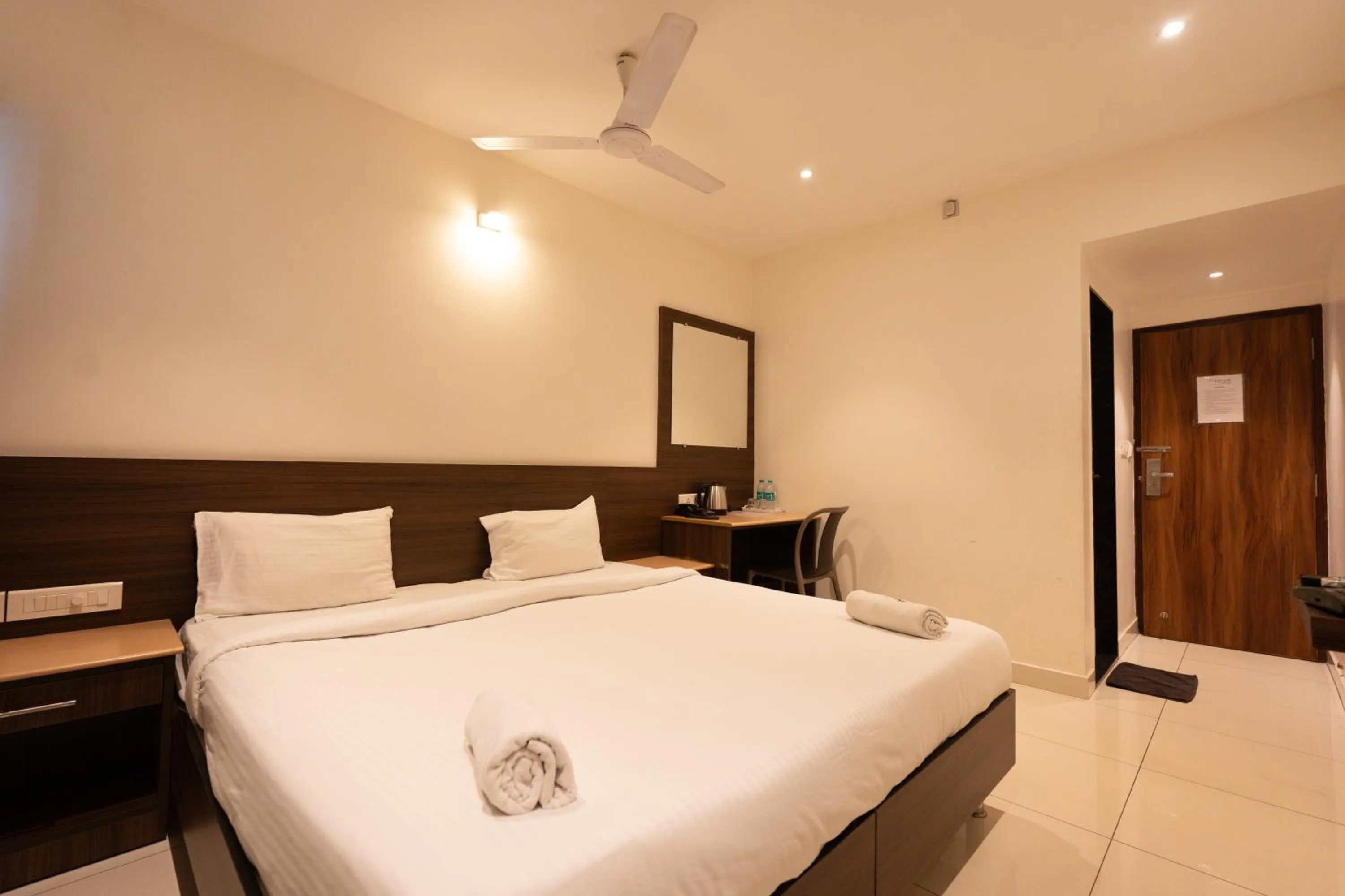 Bed in Hotel Karuna Residency