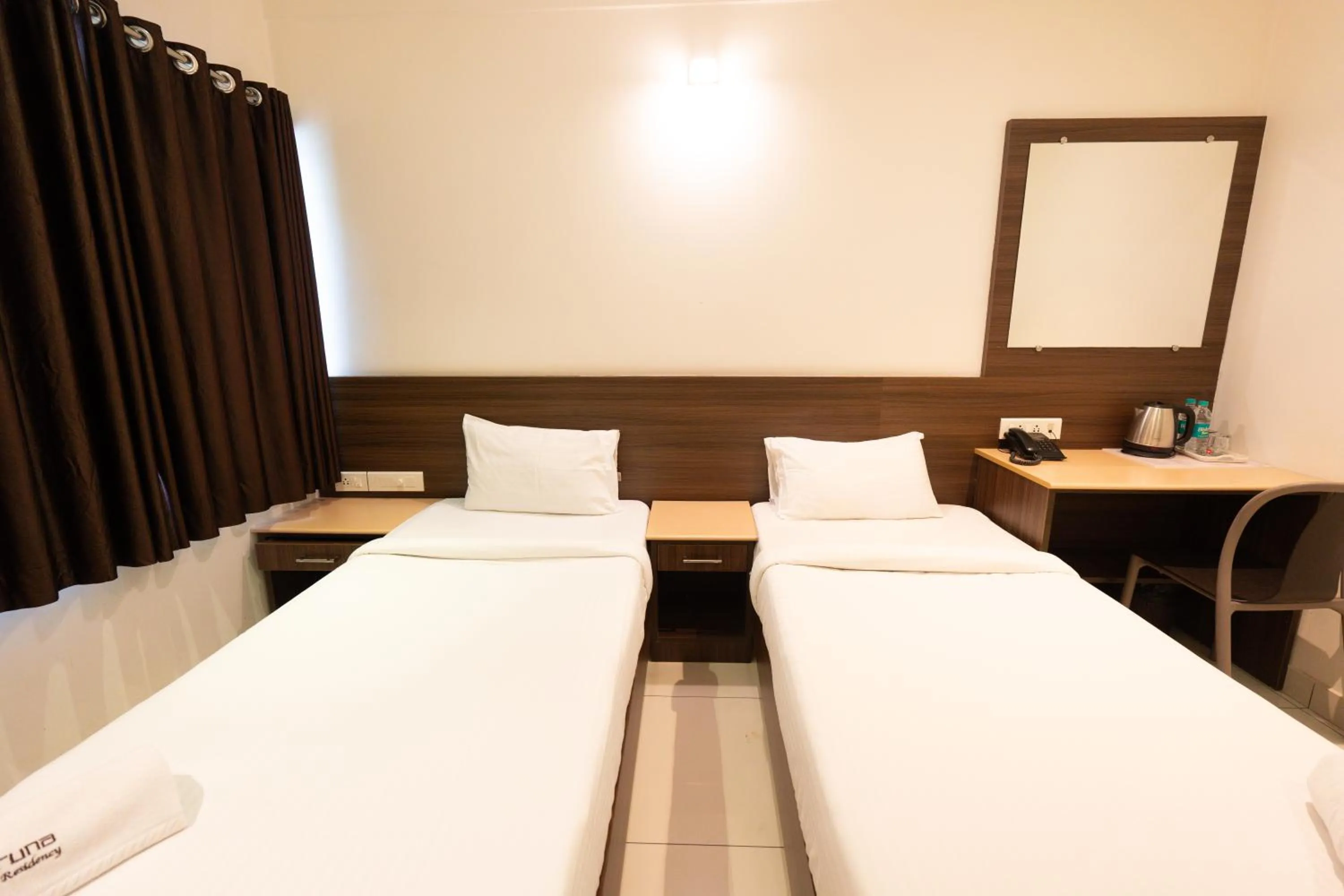 Bedroom, Bed in Hotel Karuna Residency