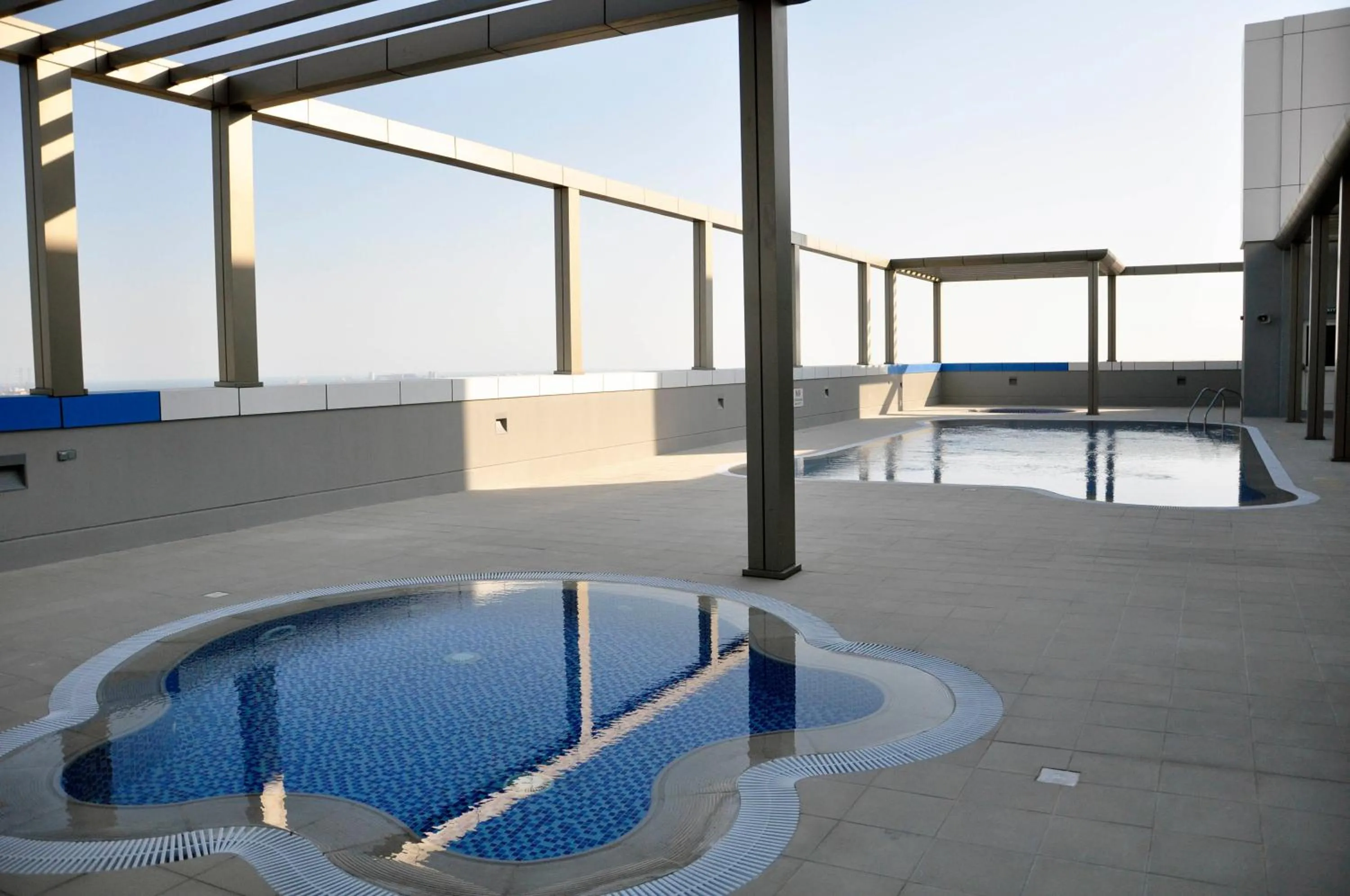 Swimming pool in Gulf Executive Hotel & Residence Juffair