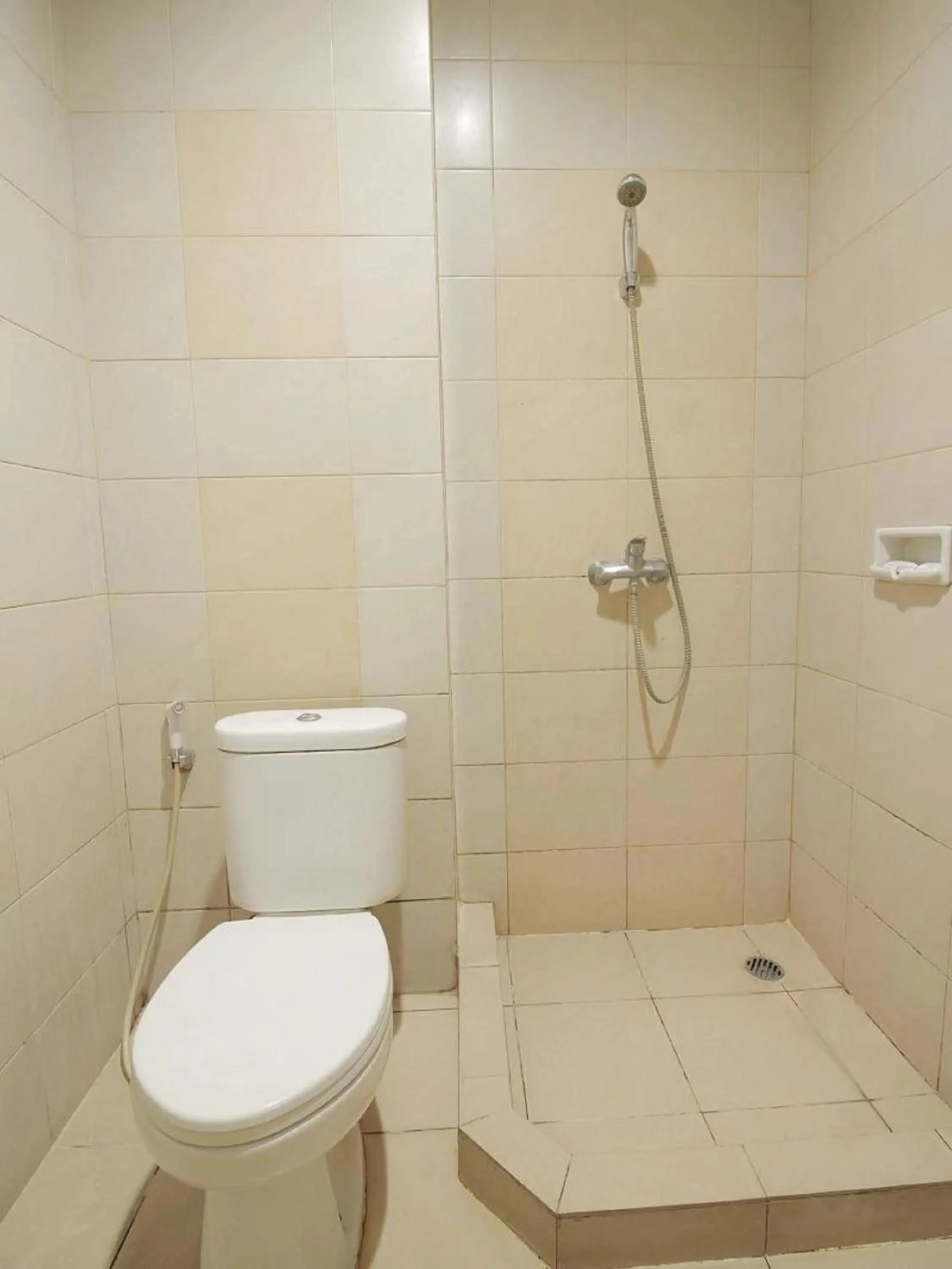 Bathroom in Capital O Galaxy Inn