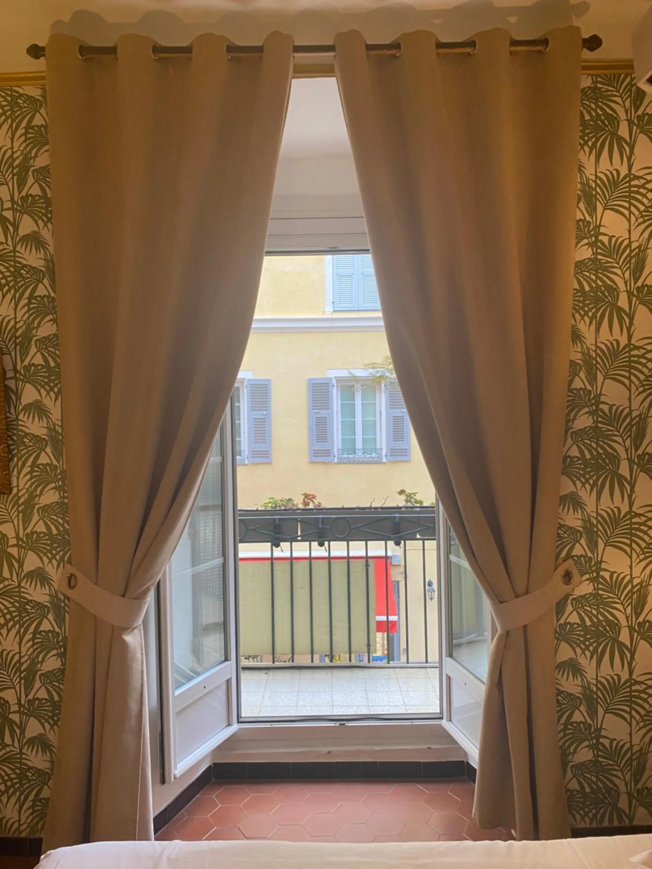 View (from property/room), Bed in Hotel Central Bastia