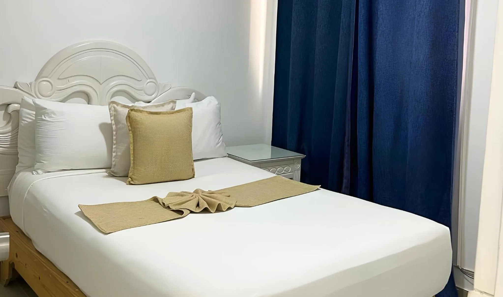 Bed in Hotel Checkin El Cortecito Beach