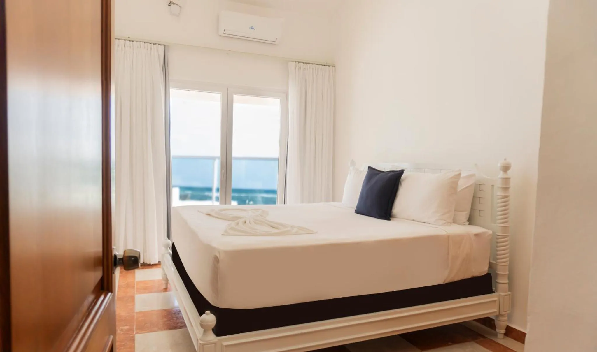 Bed in Hotel Checkin El Cortecito Beach