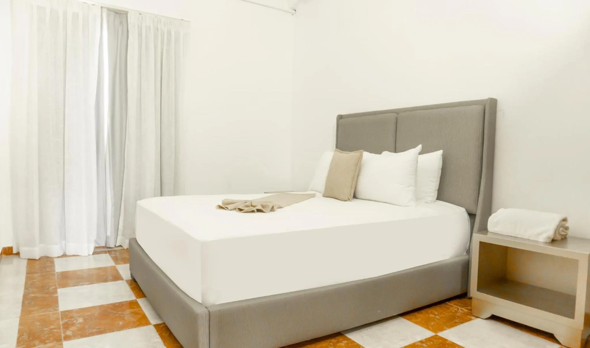 Bed in Hotel Checkin El Cortecito Beach