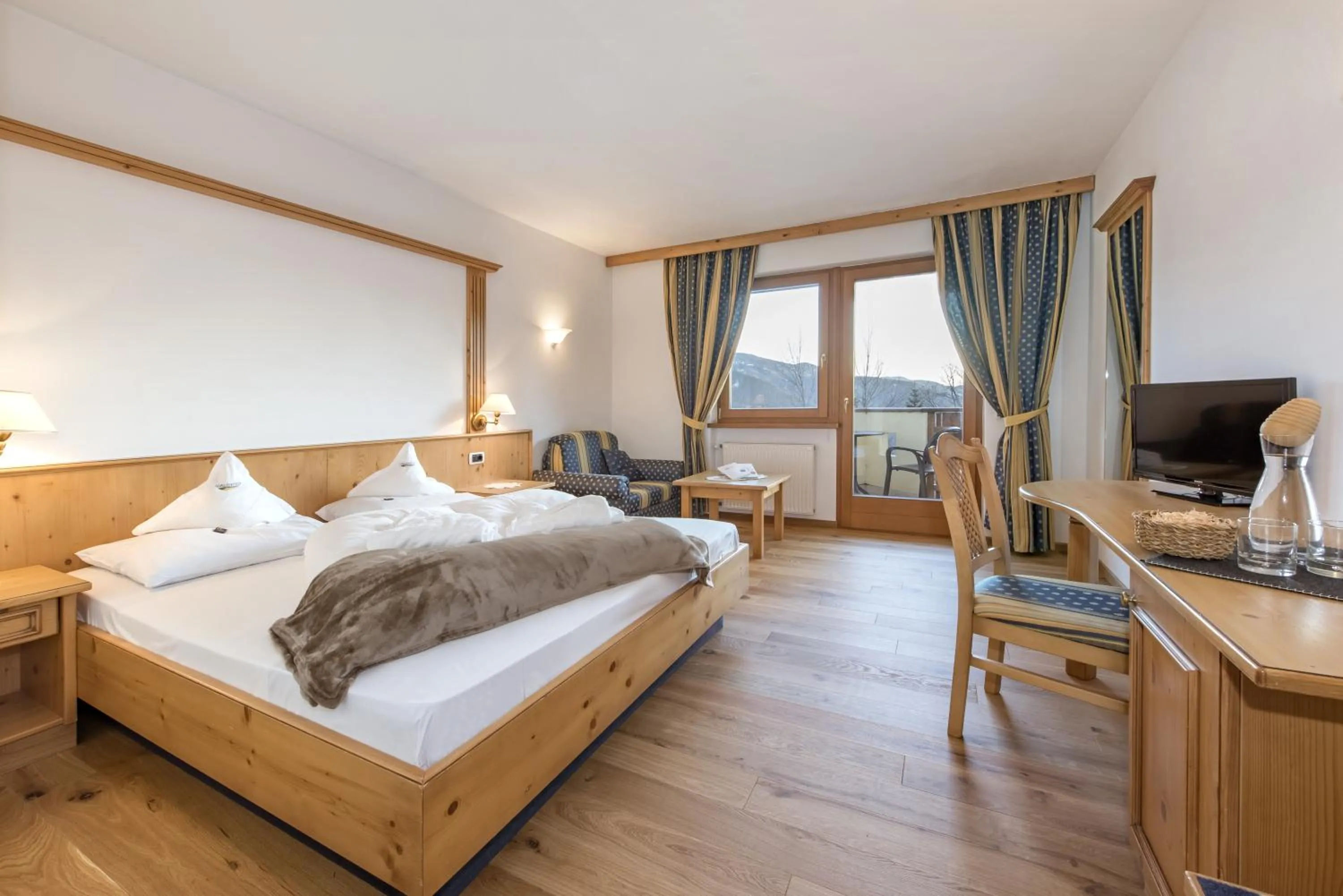 Photo of the whole room, Bed in Naturhotel Waldheim