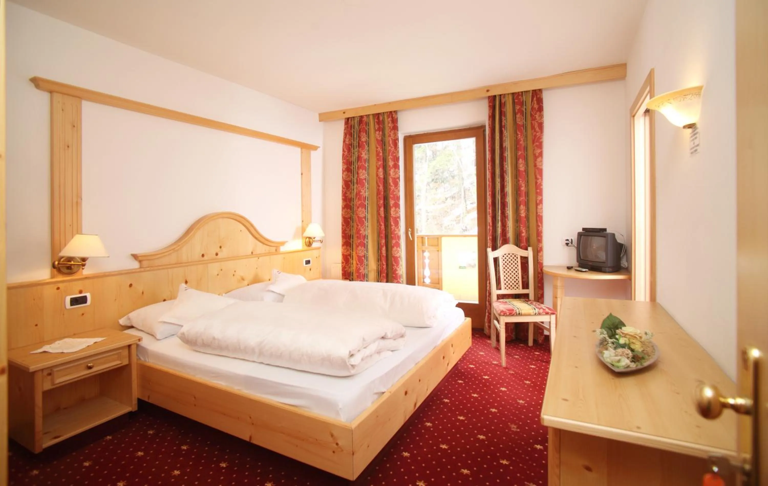 Photo of the whole room, Bed in Naturhotel Waldheim