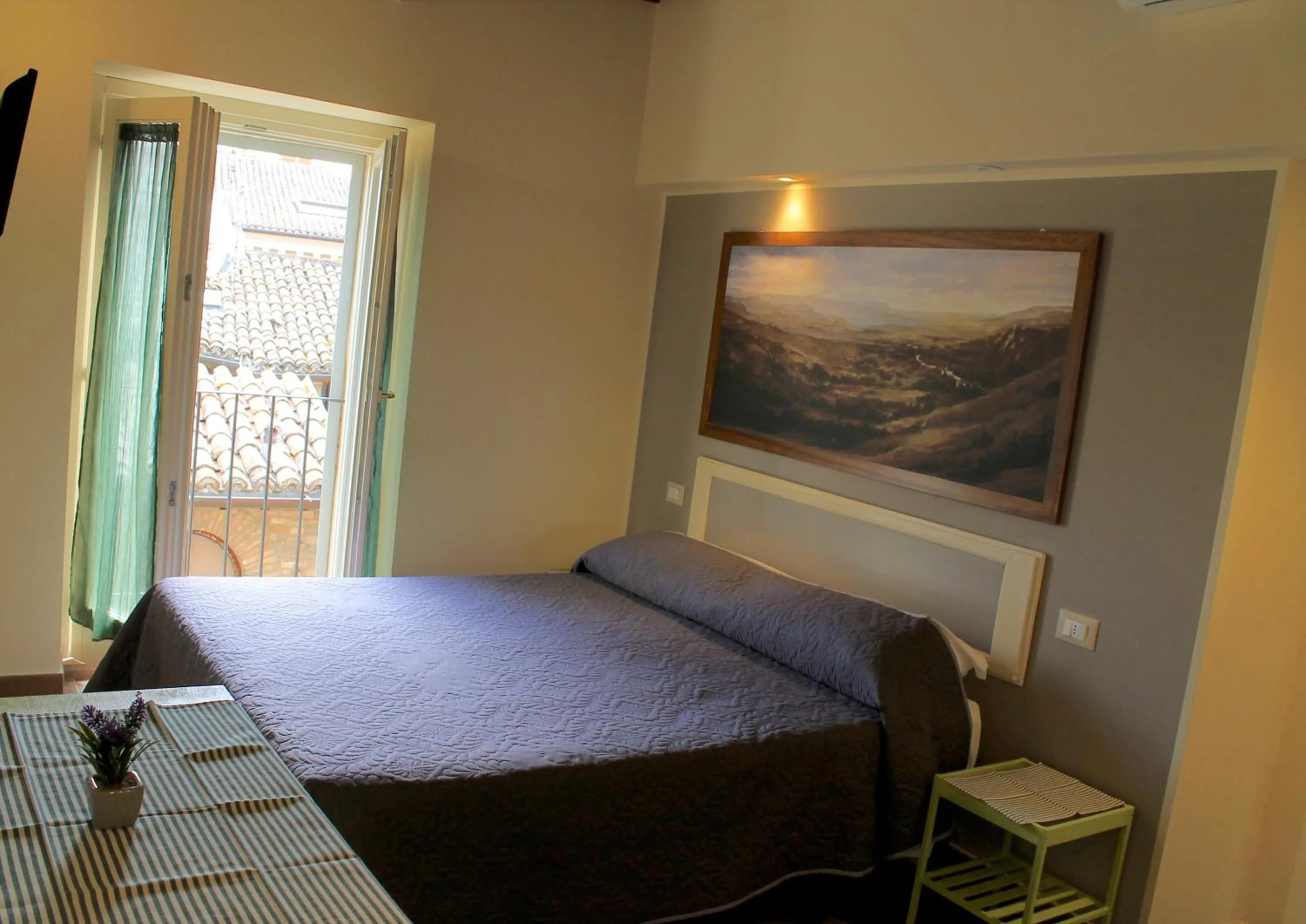 Bed in Alter Ego b&b Assisi