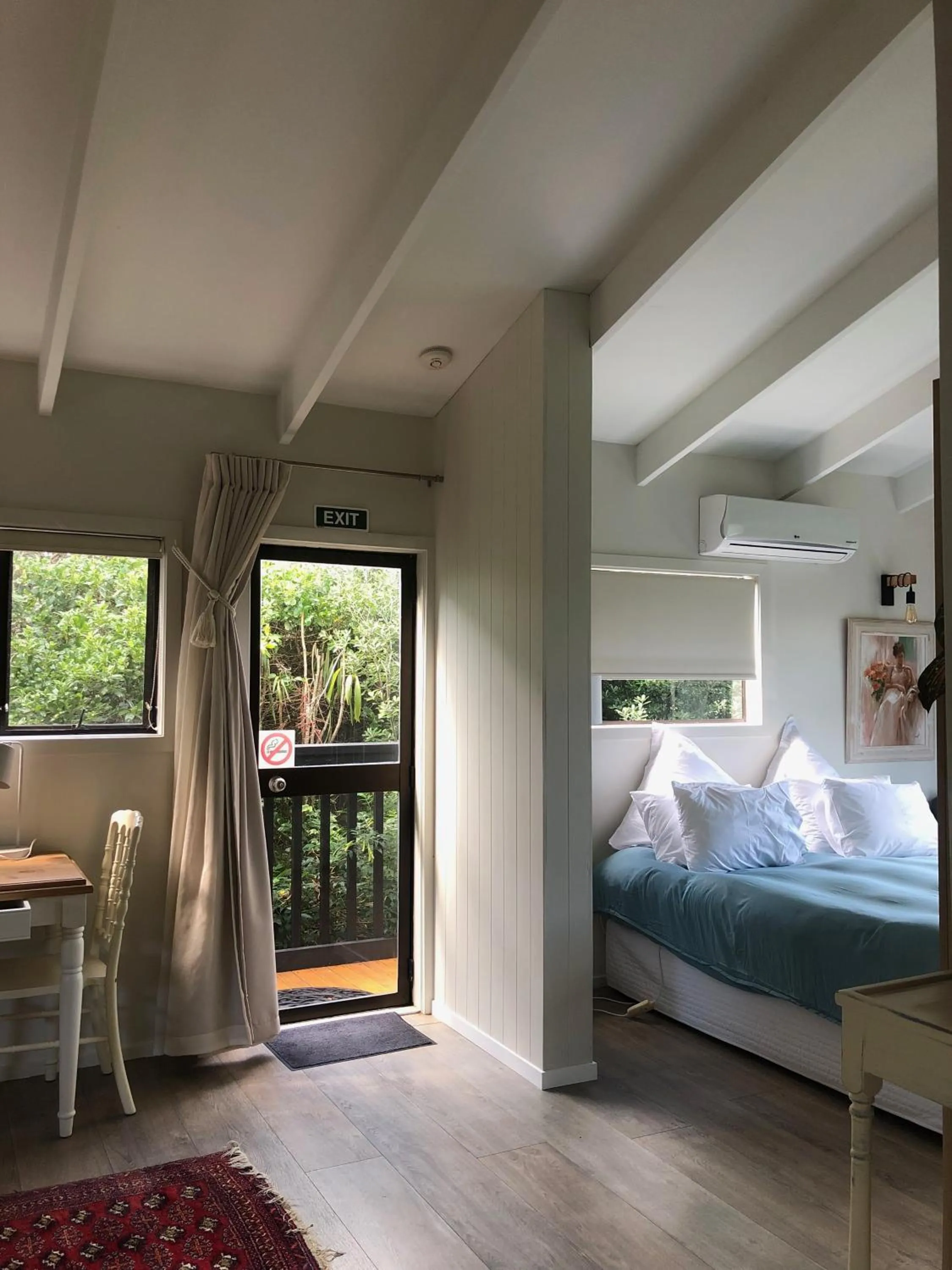 Bed in Le Chalet Waiheke Apartments