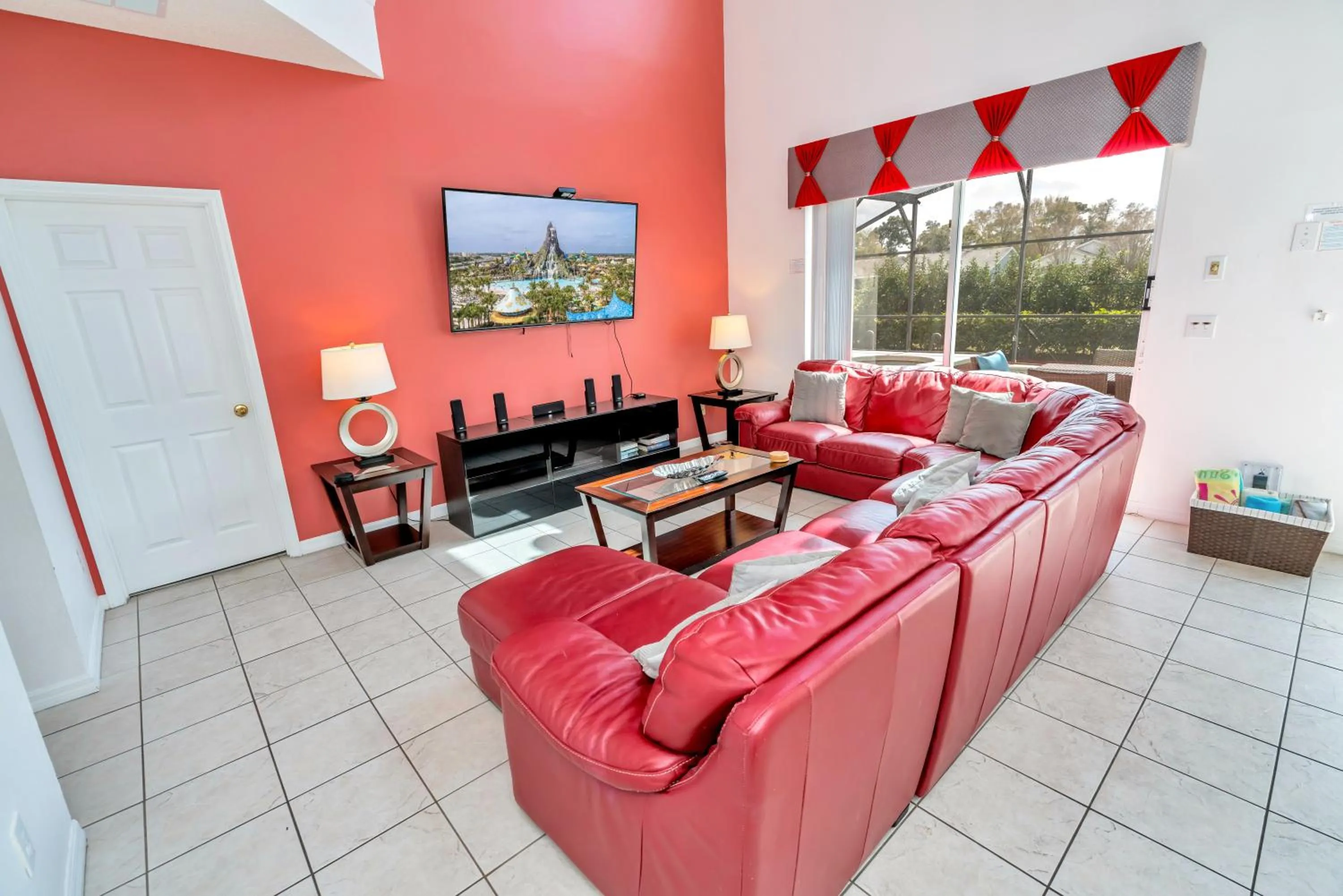 Living room in Disney Dream with Hot Tub, Pool, Xbox, Games Room, Lakeview, 10 min to Disney, Clubhouse
