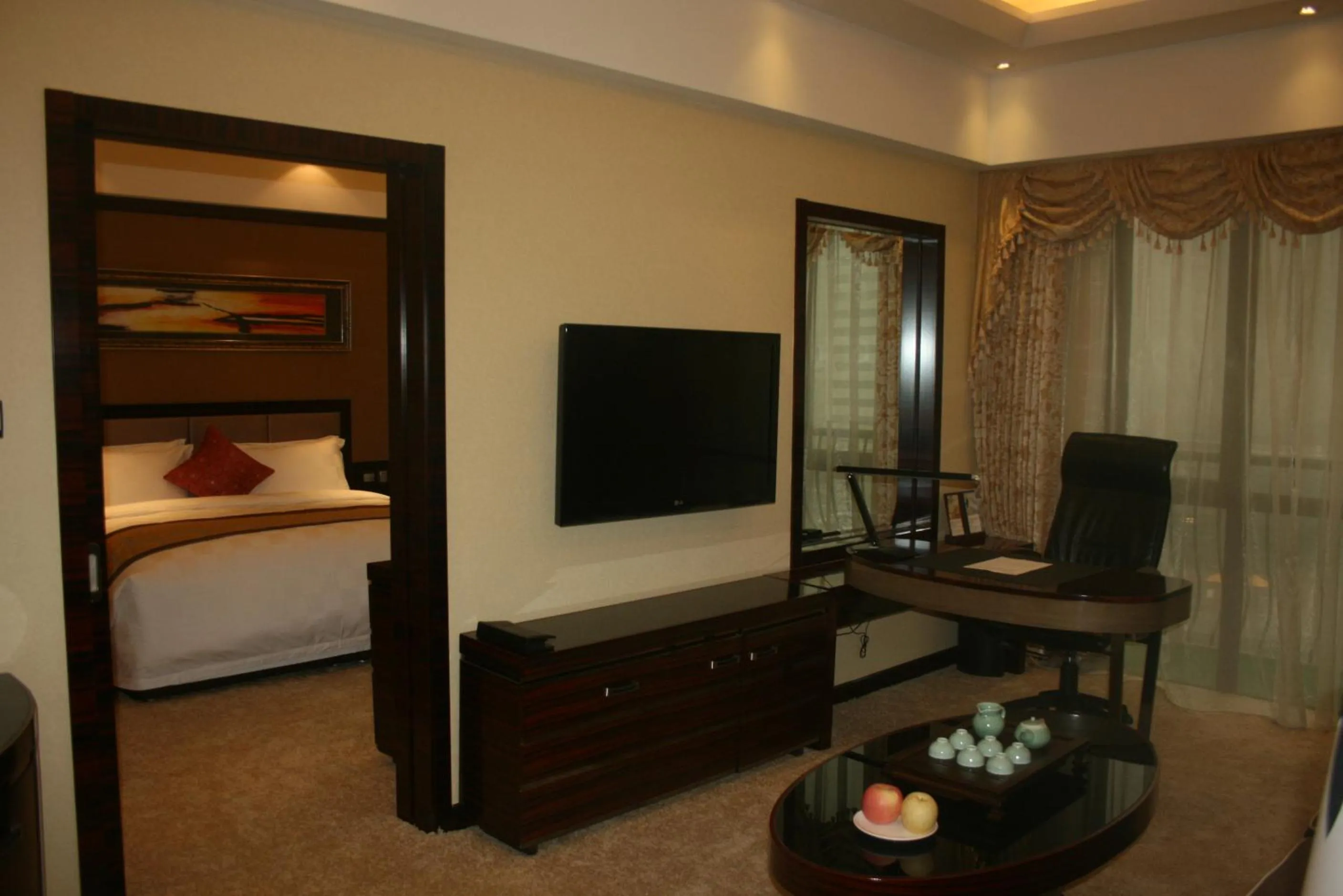 Living room, Bed in Zhengzhou Jianguo Hotel