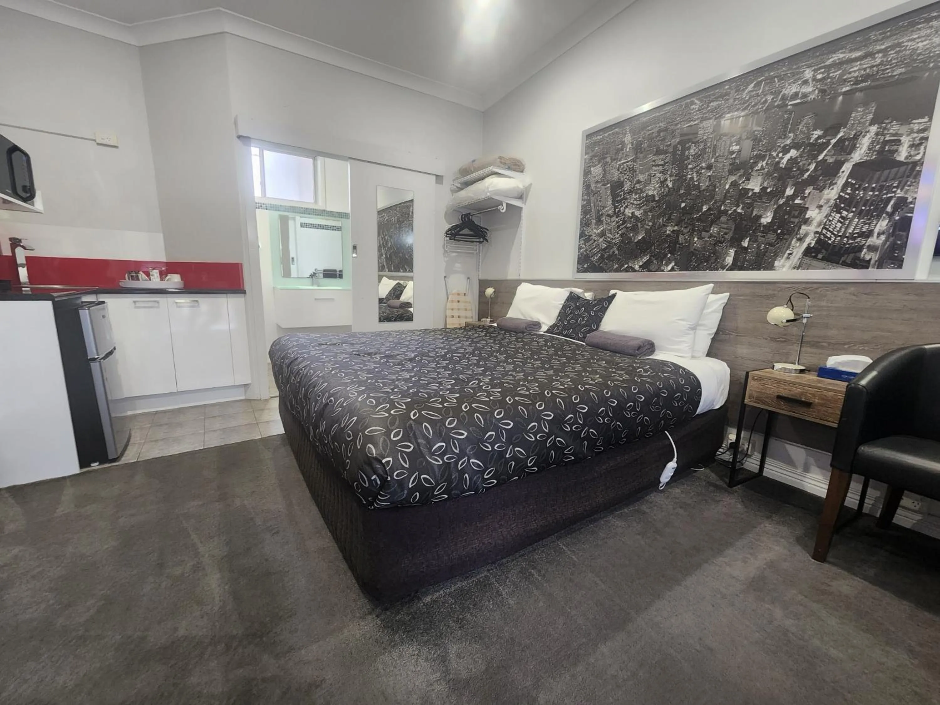 Bed in Motel24Seven and Apartments