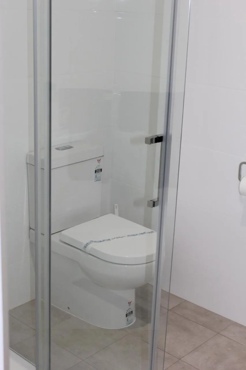 Shower in Motel24Seven and Apartments