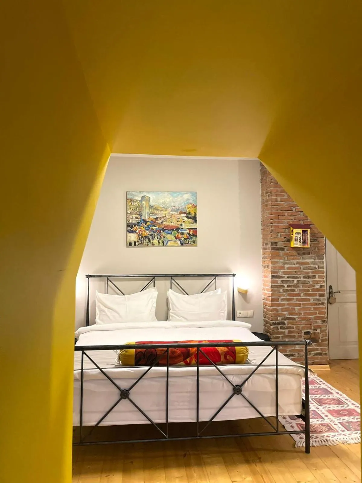 Bed in Arts Hotel Tbilisi