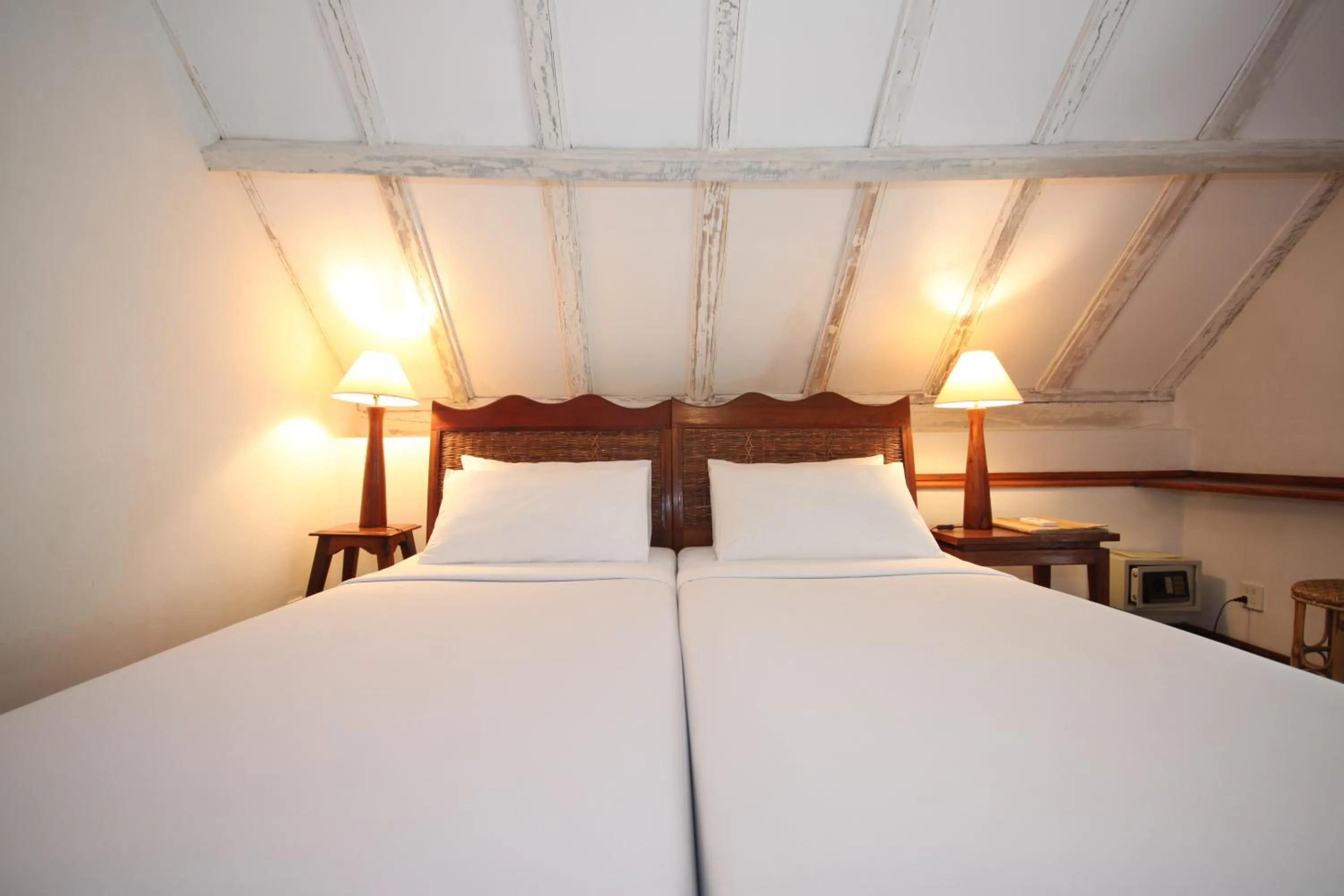 Bed in Sala Prabang Hotel