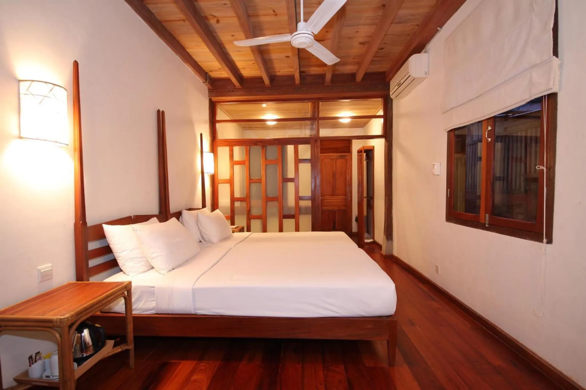 Bed in Sala Prabang Hotel