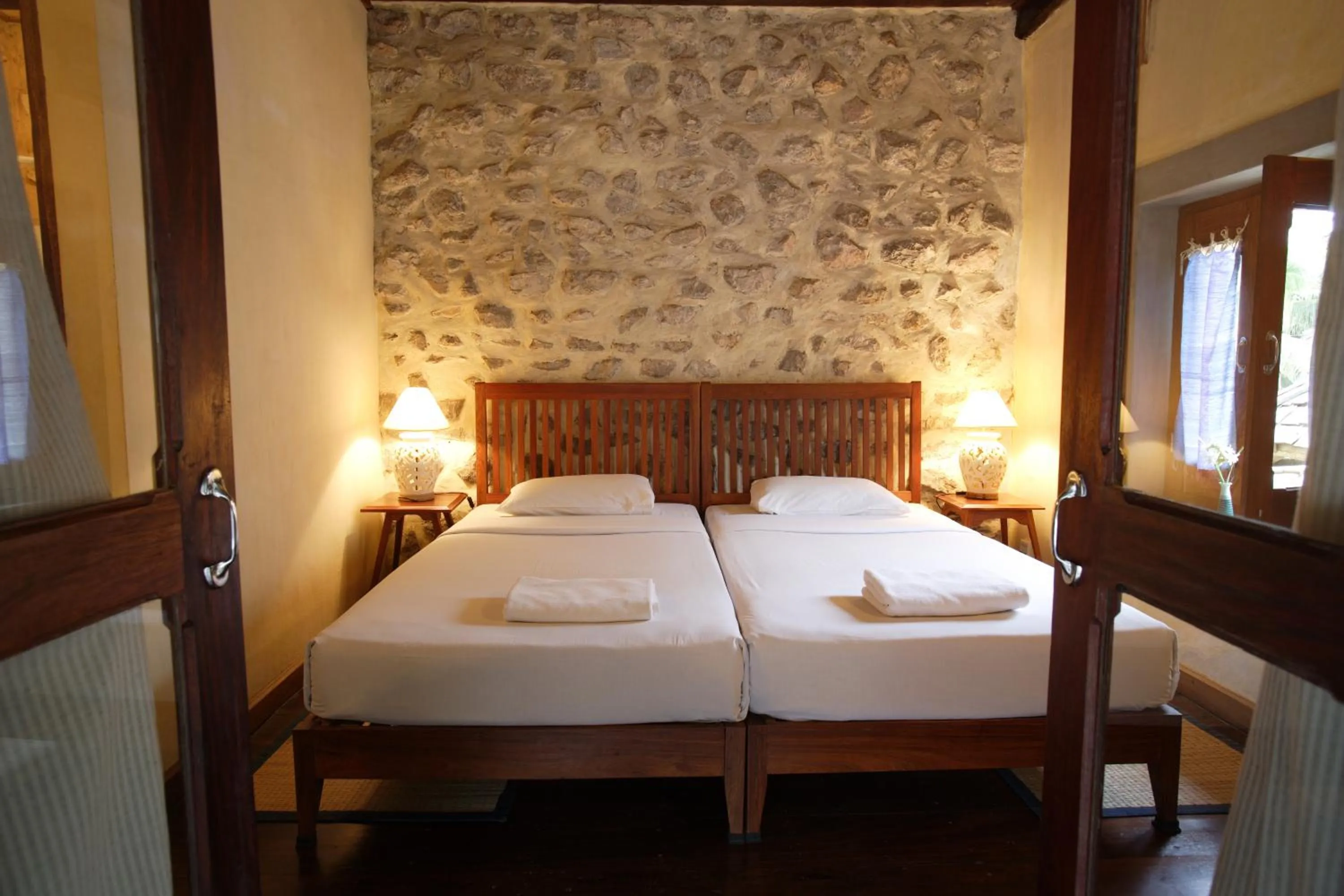 Bed in Sala Prabang Hotel