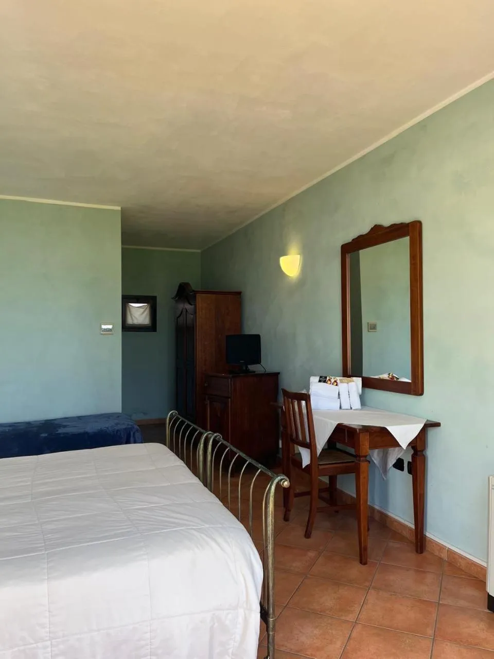 Bed in Albergo Cosmera