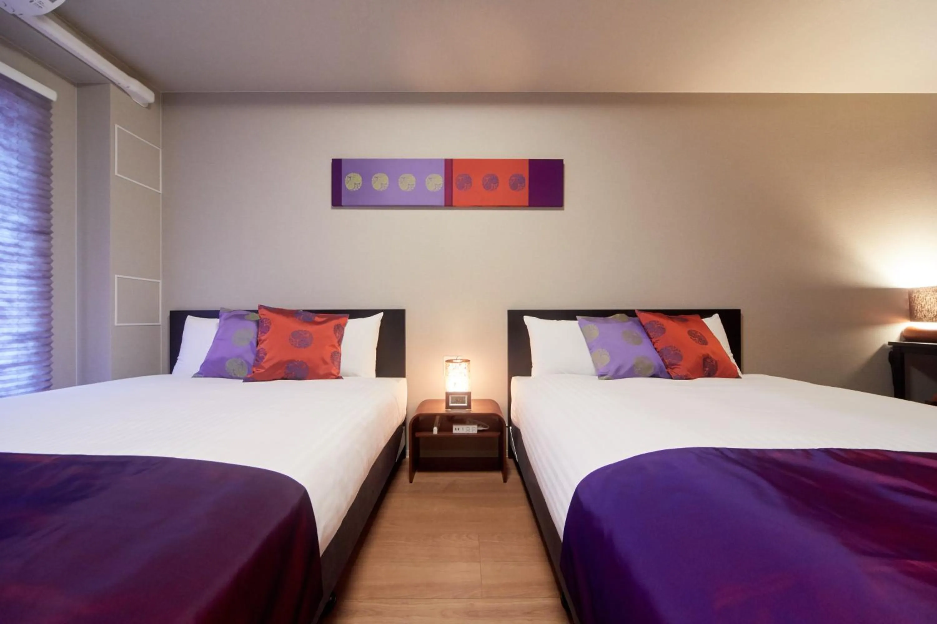 Bed in Hotel Mondonce Kyoto Gojo