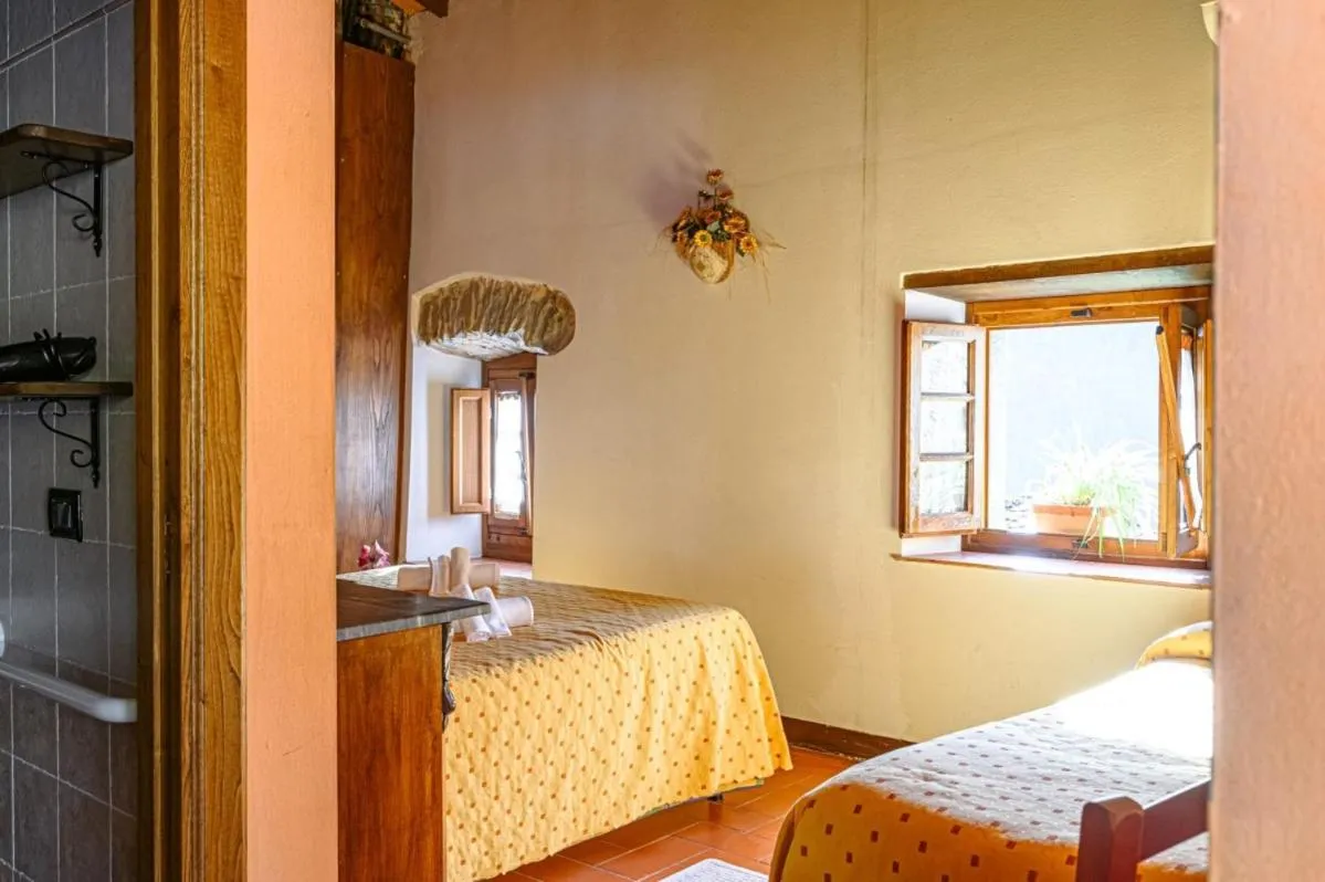 Bed in Agriturismo Pian di Fiume