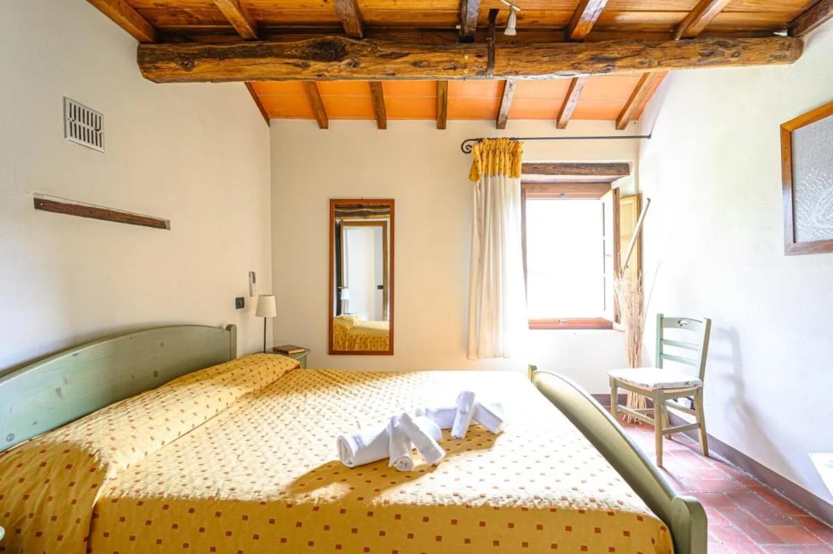 Bed in Agriturismo Pian di Fiume