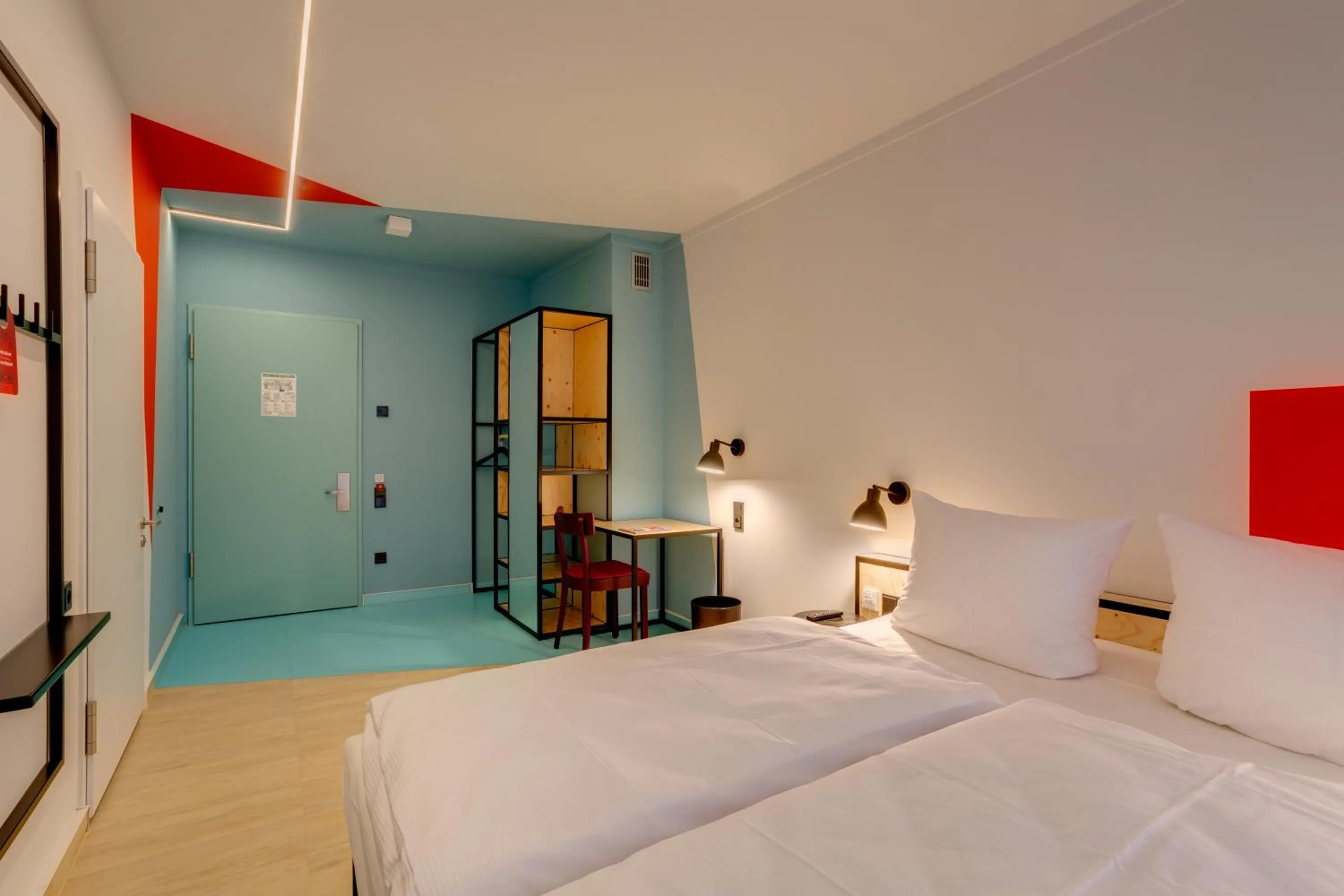 Photo of the whole room, Bed in MEININGER Hotel Leipzig Hauptbahnhof