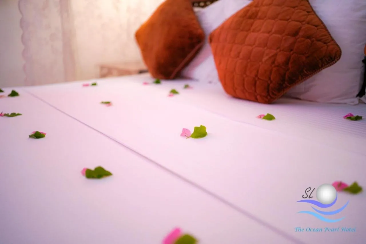 Bed in The Ocean Pearl Hotel Negombo