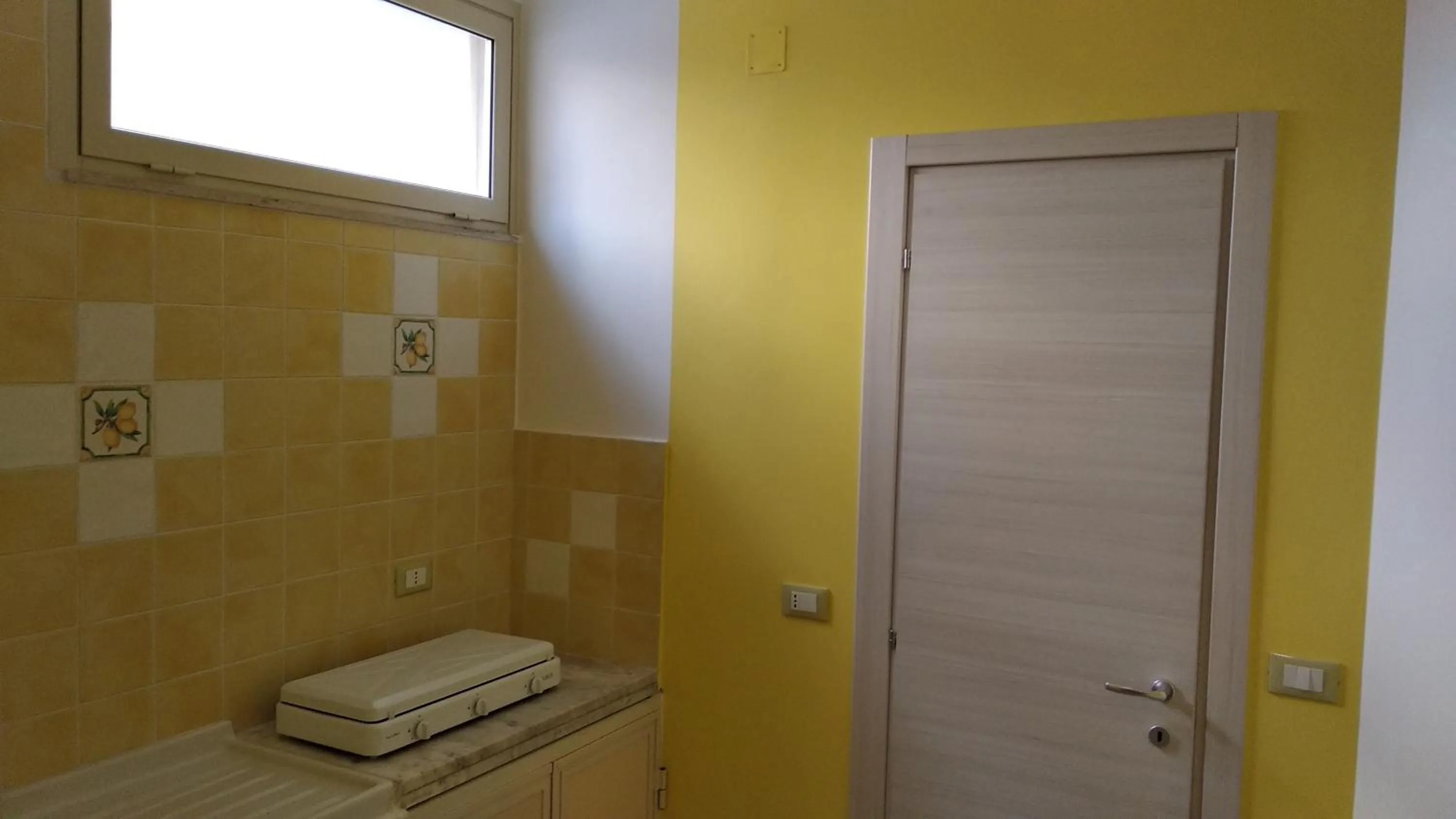 Kitchen or kitchenette in B&B Rossini