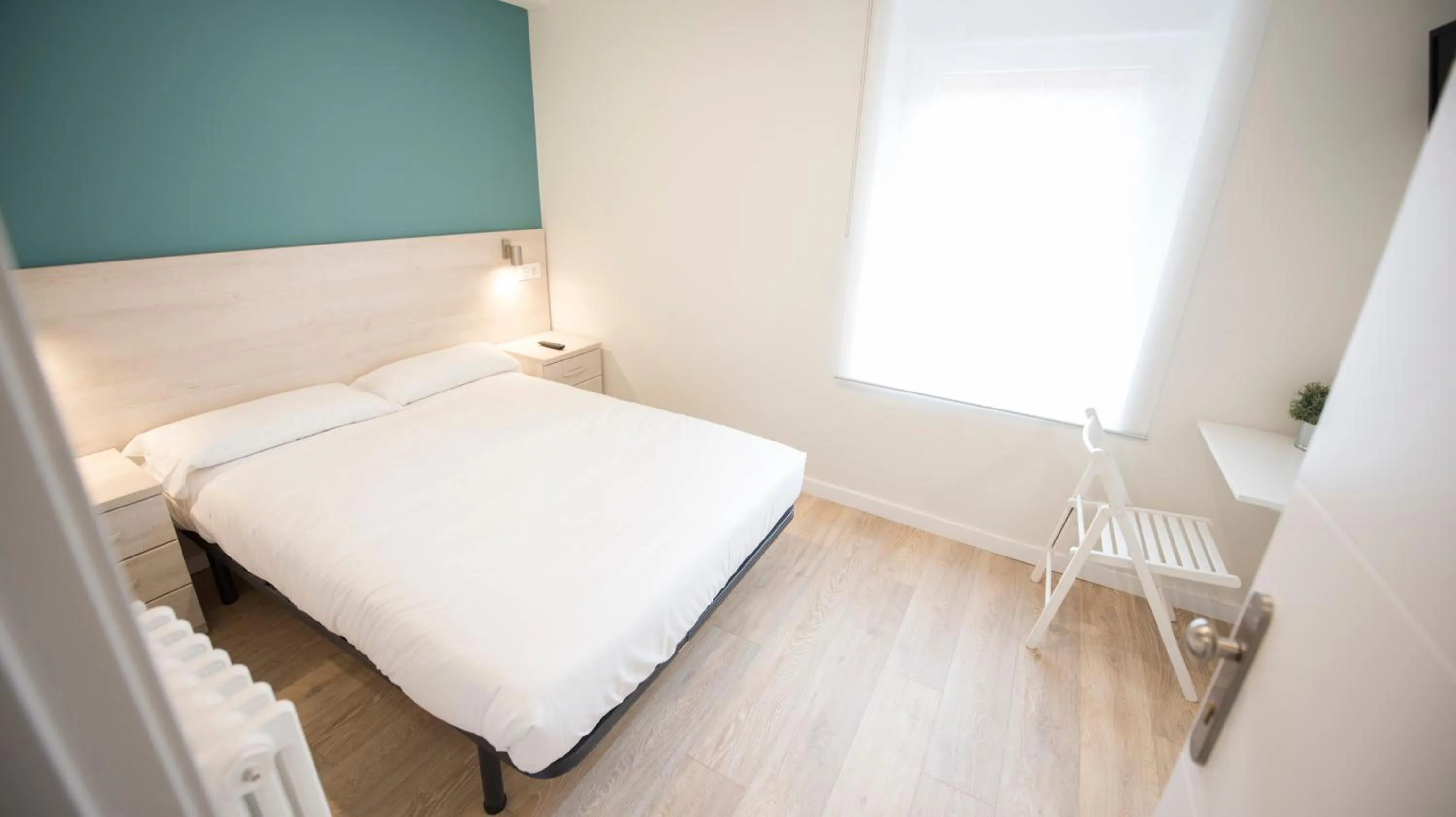 Decorative detail, Bed in Happy Hostal Carrales