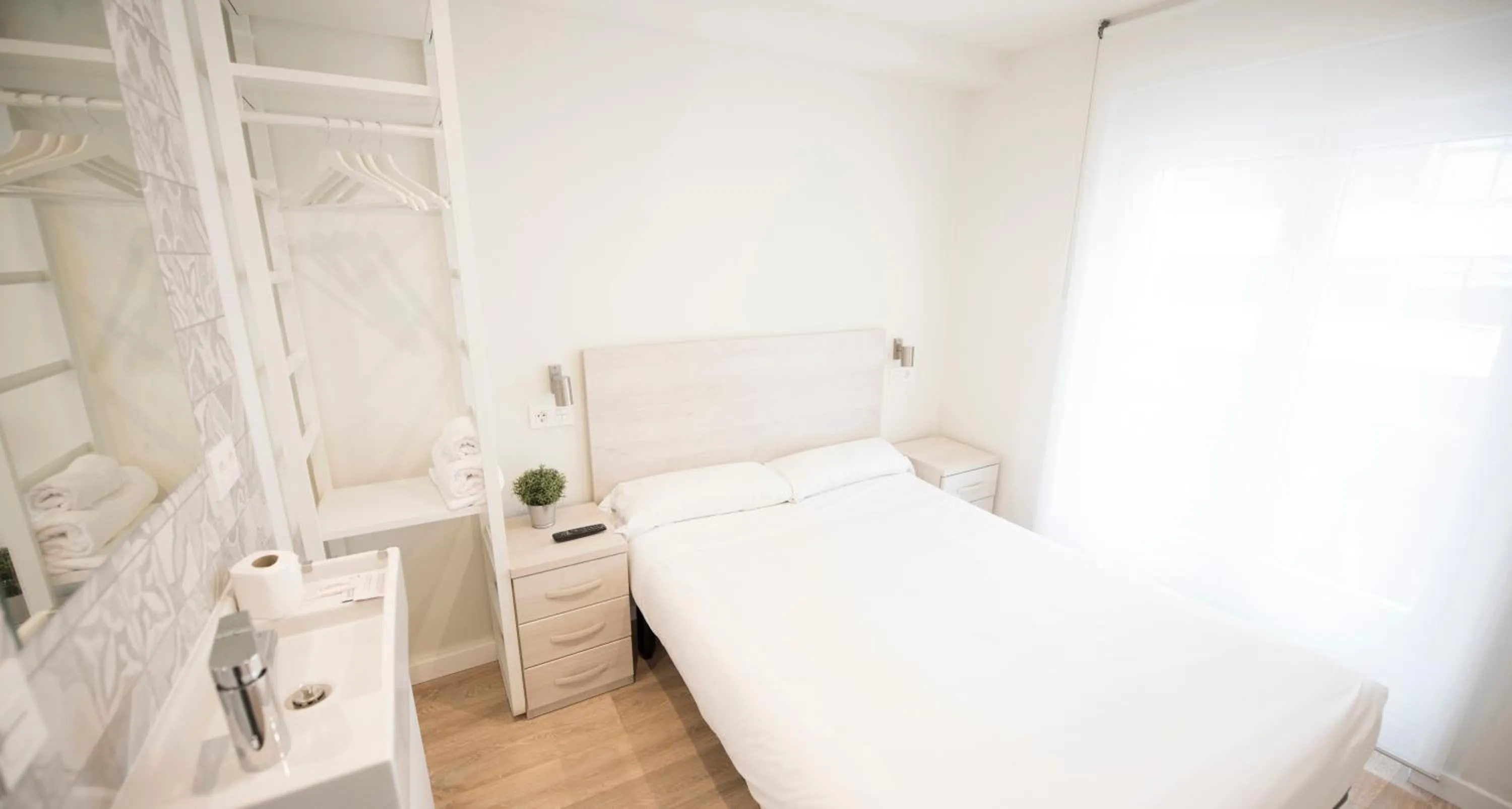 Photo of the whole room, Bed in Happy Hostal Carrales