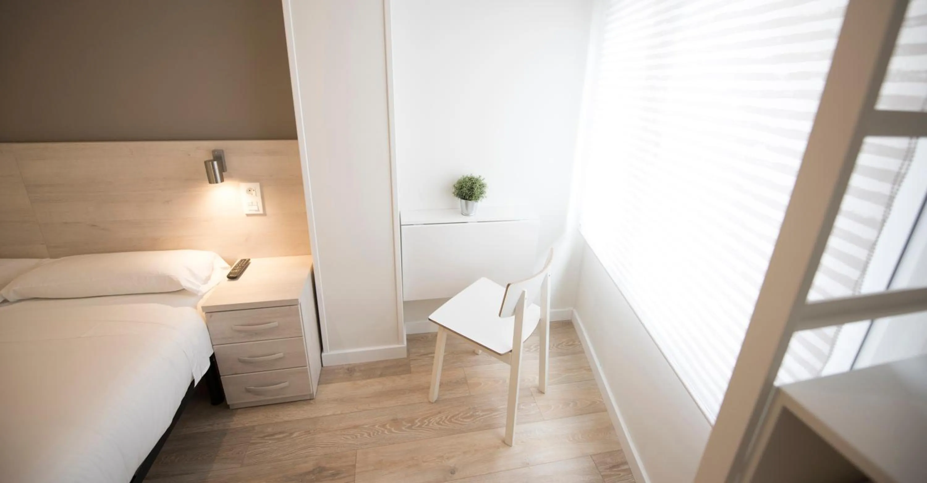 Decorative detail, Bed in Happy Hostal Carrales