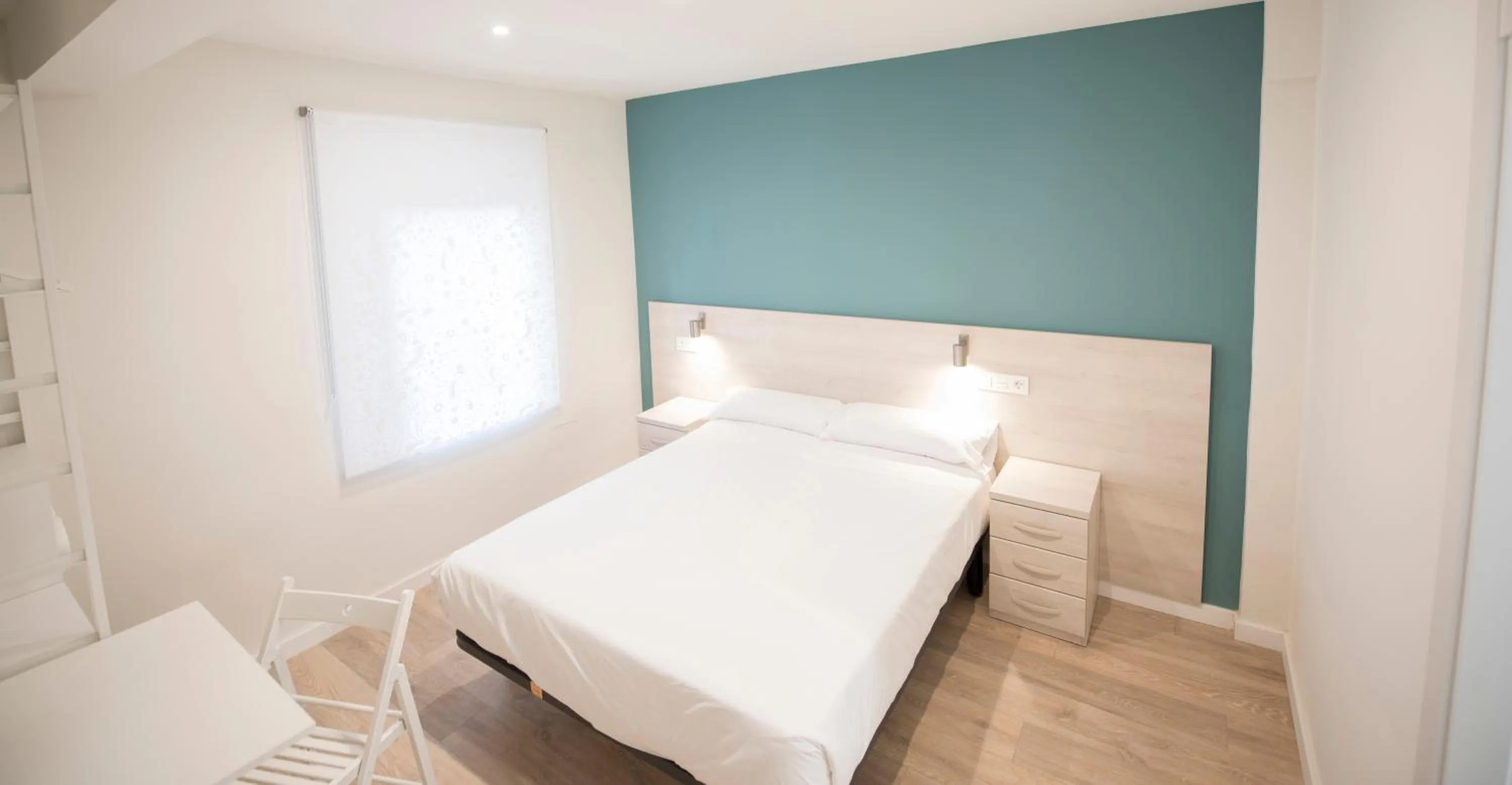 Photo of the whole room, Bed in Happy Hostal Carrales