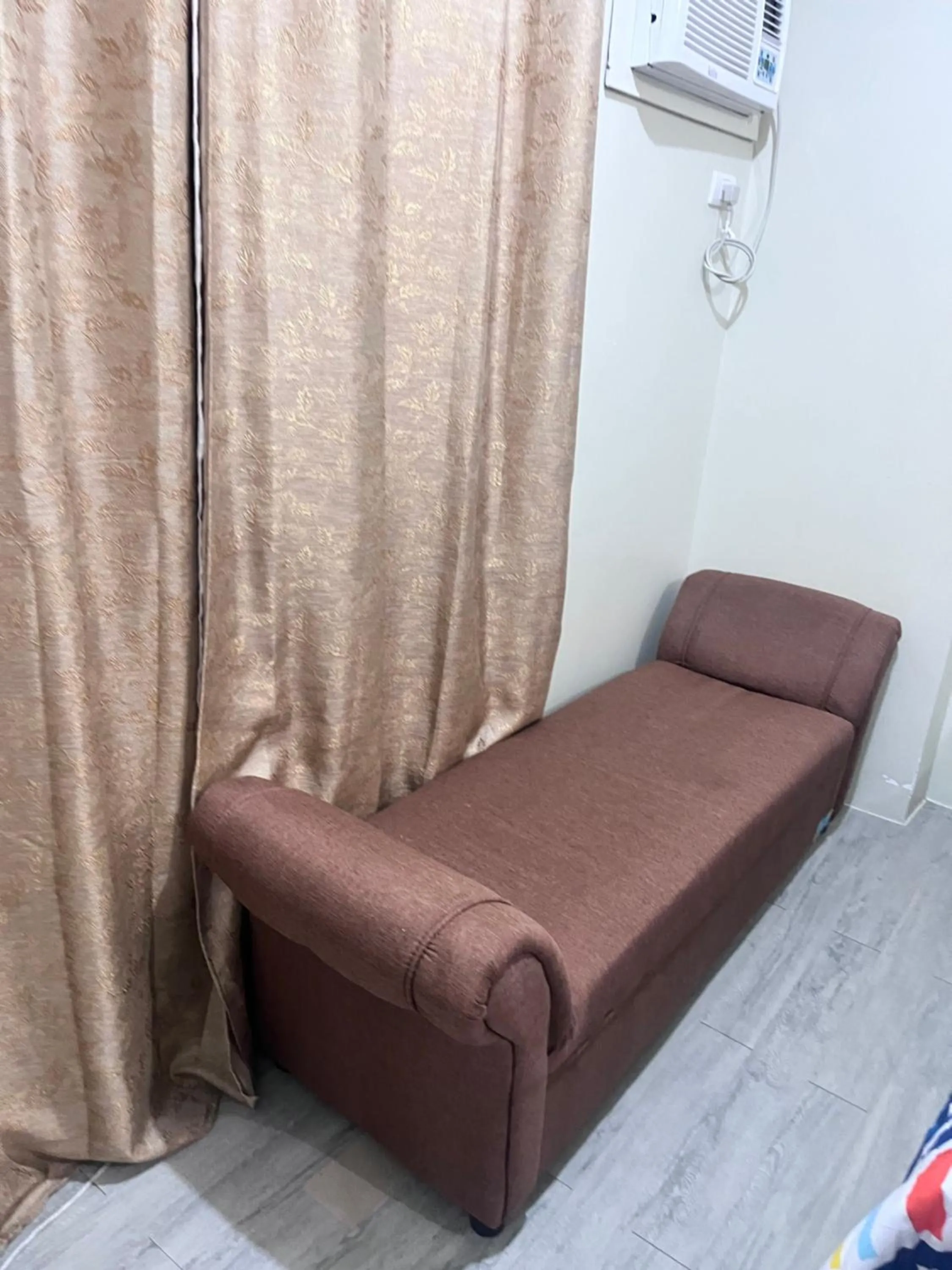 Seating area in Staycation condo with pool near SM Tungko, Bulacan