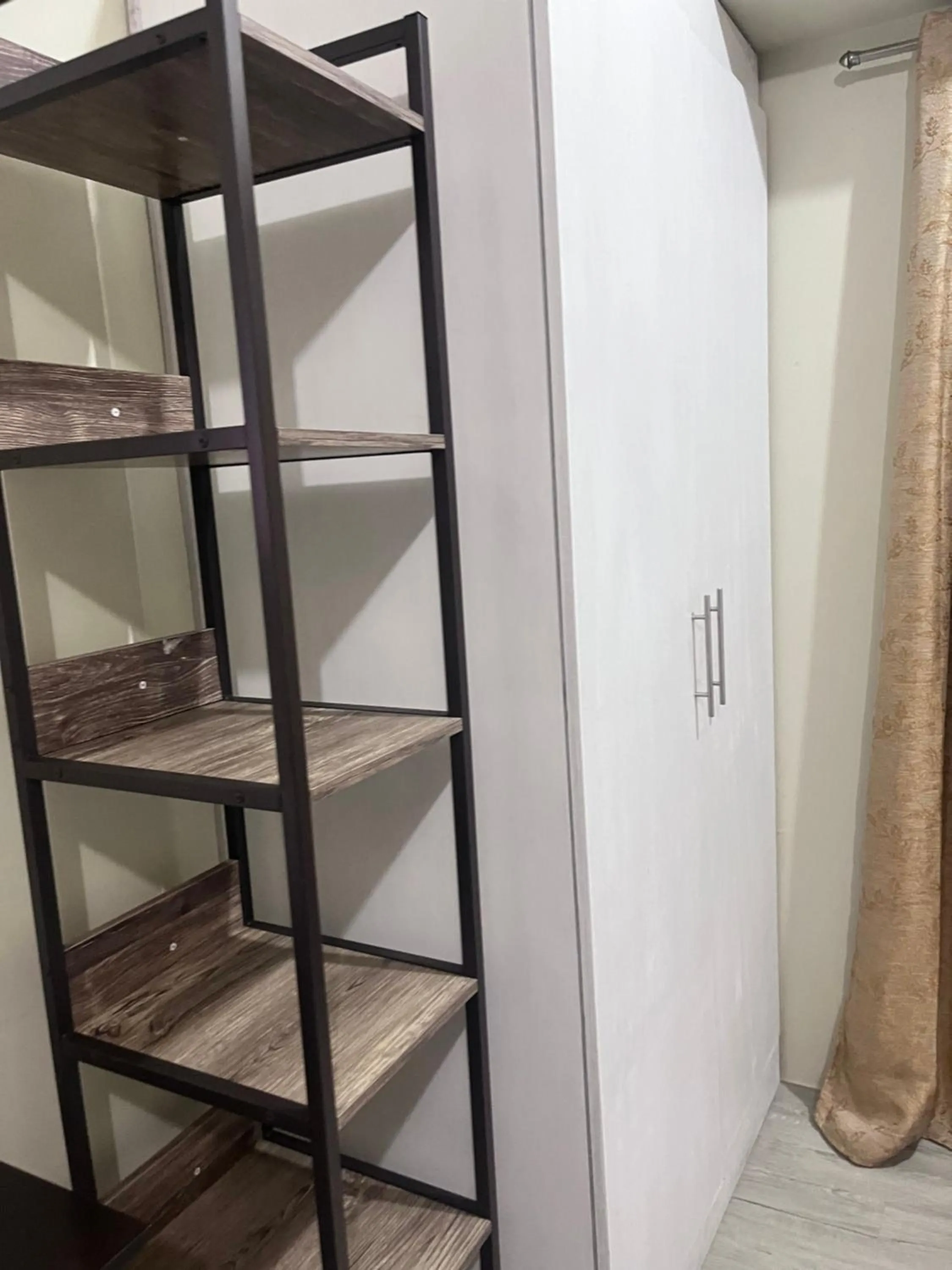 wardrobe in Staycation condo with pool near SM Tungko, Bulacan