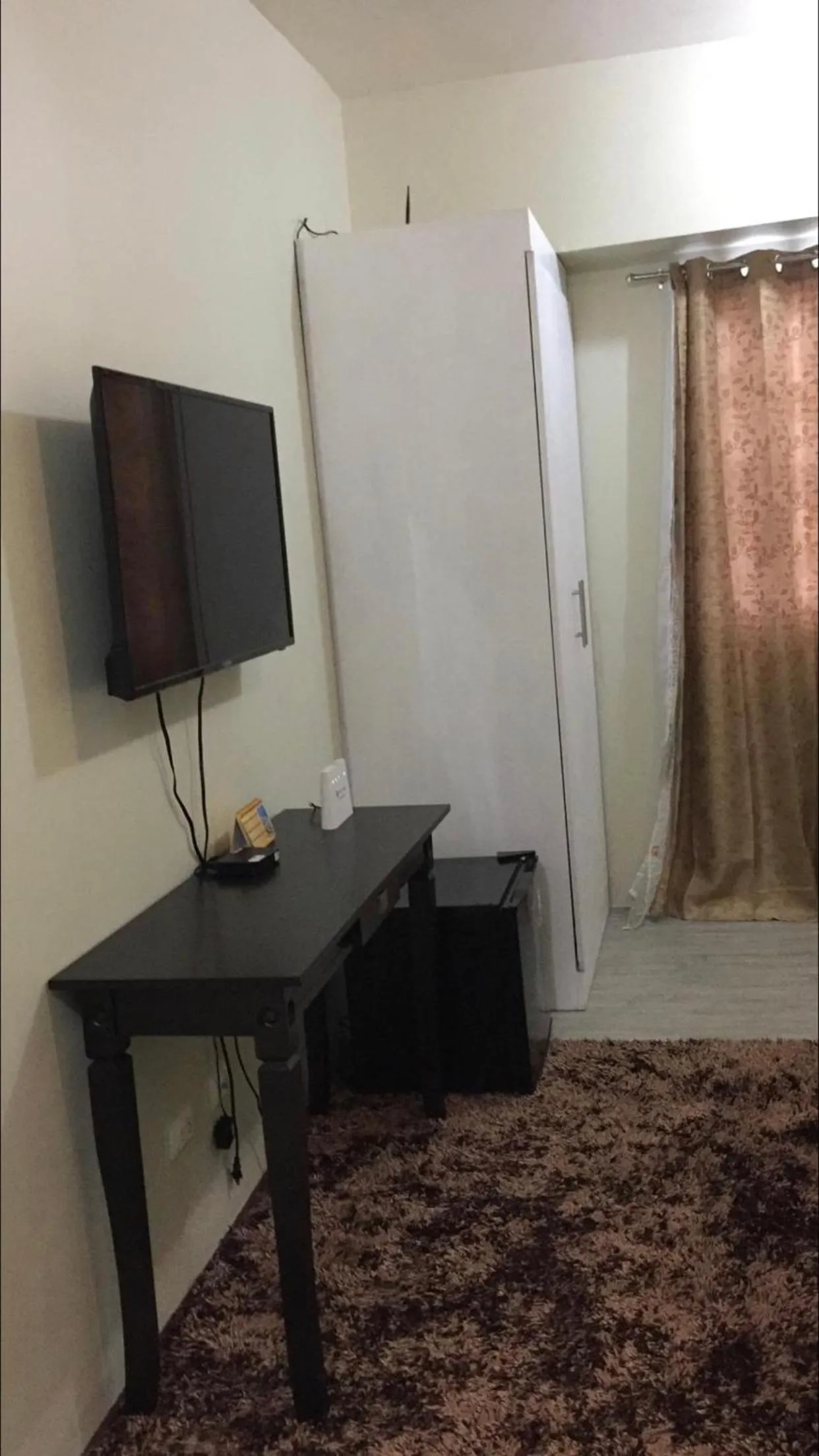 TV and multimedia in Staycation condo with pool near SM Tungko, Bulacan