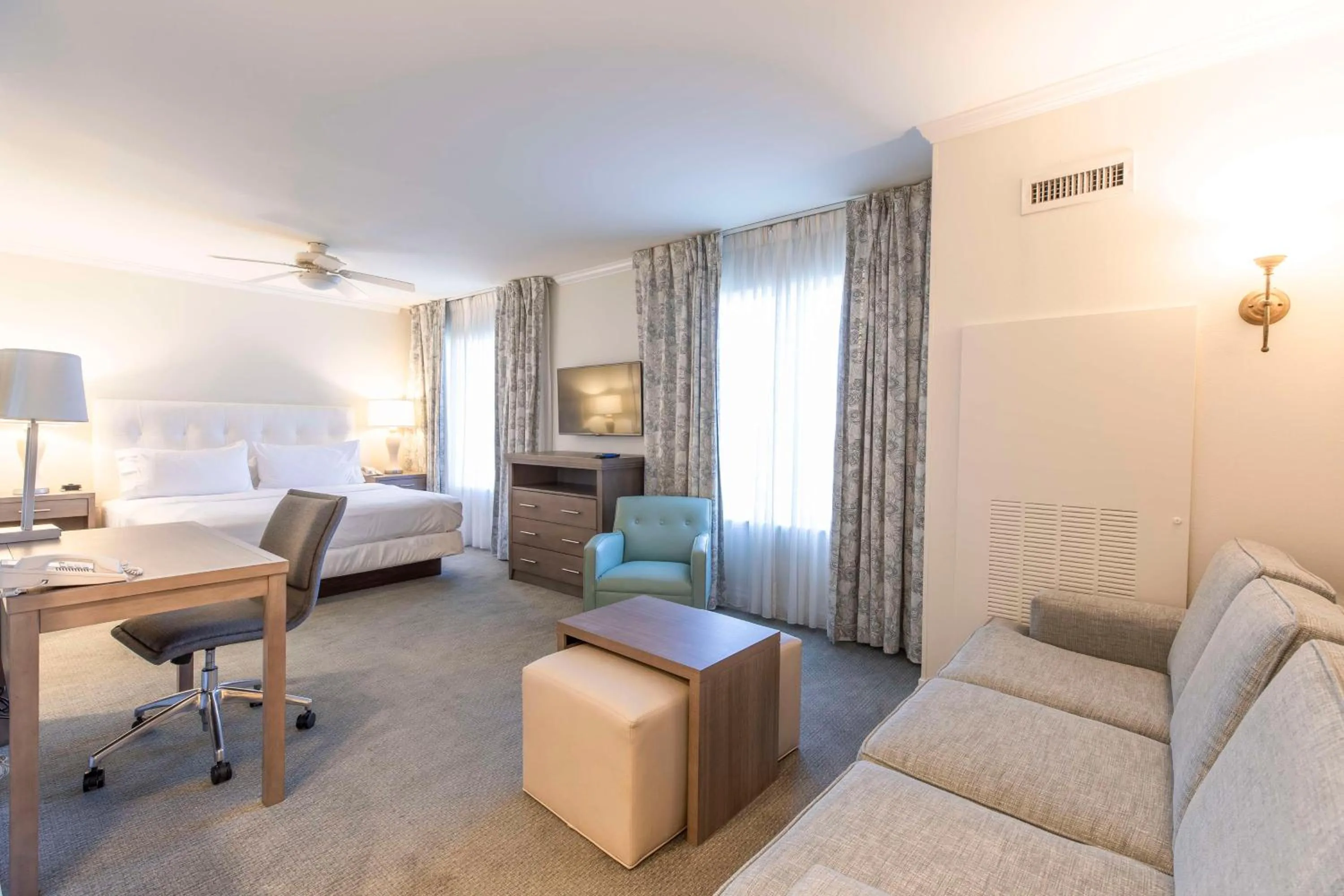 Living room, Bed in Homewood Suites by Hilton Palm Beach Gardens